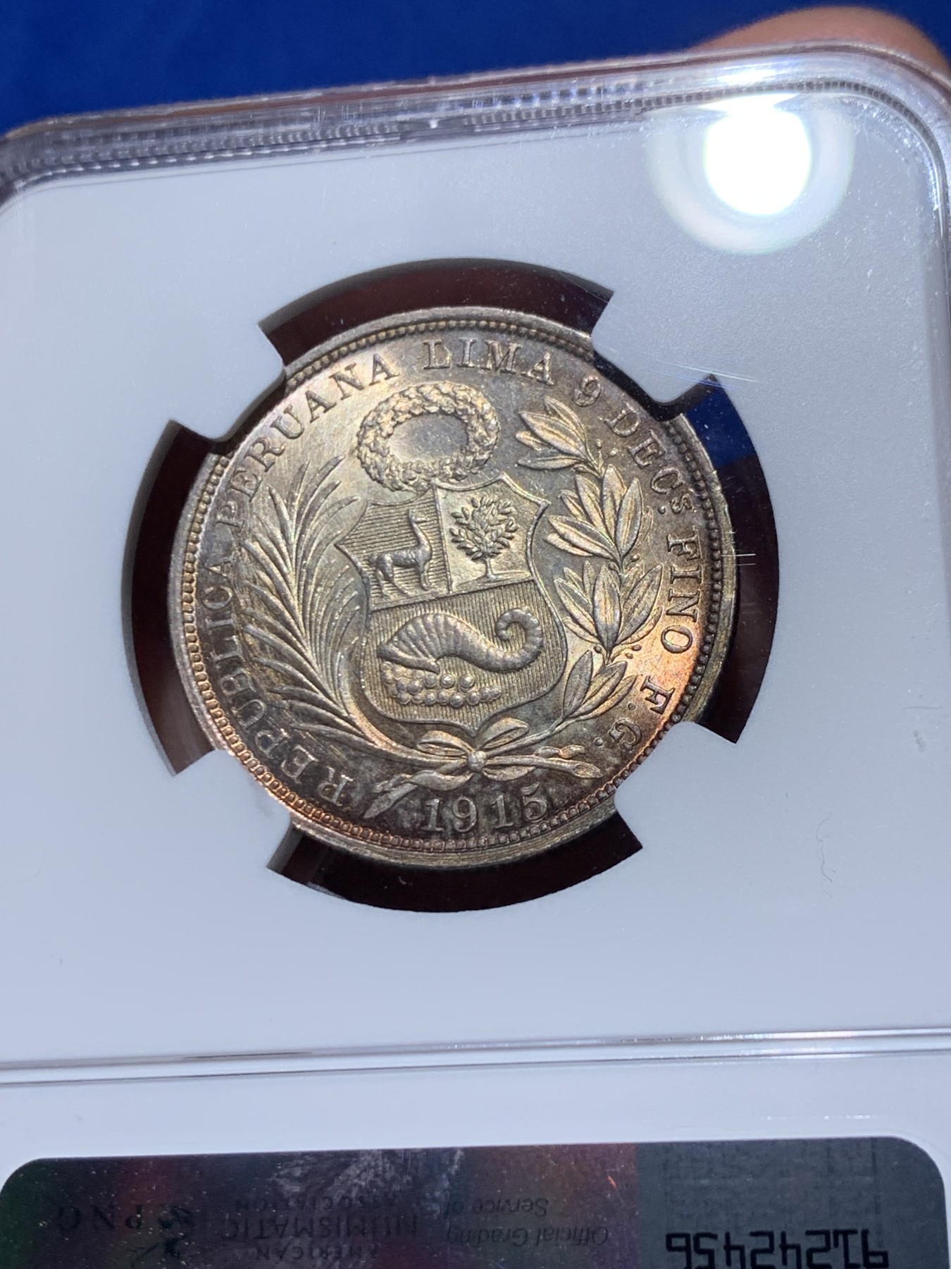 《竞宝斋》第261场-周日，周一，周二 3场连拍 (全场包邮) NGC MS64 秘鲁 1915年 1/2比索 银币 高银版 状态极好 刷双面金色包浆 高分不易