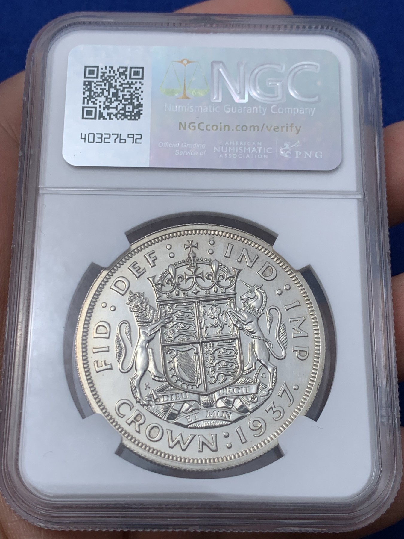 《竞宝斋》第261场-周日，周一，周二 3场连拍 (全场包邮) NGC PROOF 英国1937年乔治六世登基1克朗精制银币，PROOF精制币，车轮强转光，打制精美，高浮雕币面清爽干净又漂亮。