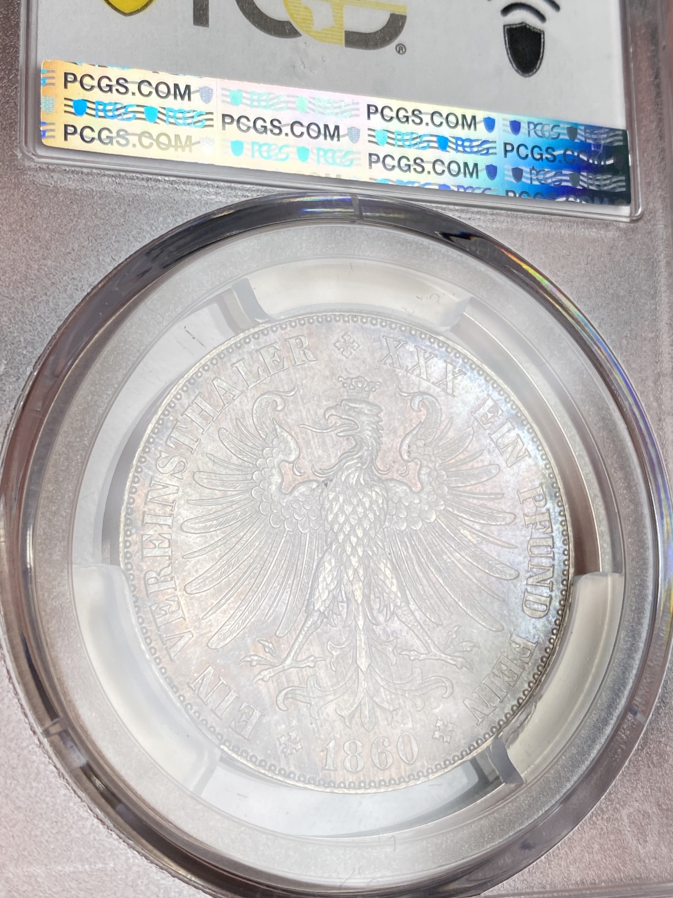 万国钱币拍卖第024期（诸神之战） PCGS MS64 1860年德国法兰克福女神鹰徽流通1泰勒 此版本首年 实物状态蓝金色渐变环彩 实实在在是太漂亮了 一旦上手就放不下来的状态