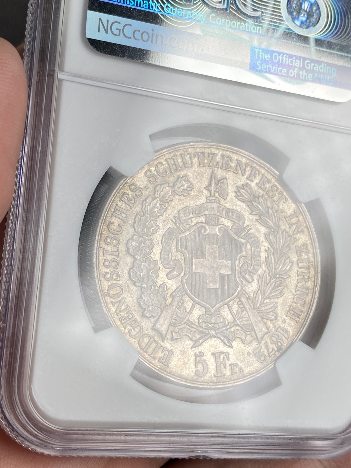 万国钱币拍卖第024期（诸神之战） NGC MS63 1872年瑞士苏黎世射击节5法郎大银币 欧洲青金色包浆 收藏把玩的优质选择