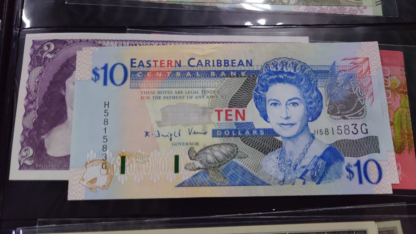 【世界钱币】精选微拍第102期暨2024年第13期  部分卖剩货品继续拍 东加勒比10元 H～G冠全新绝品无47尾号583