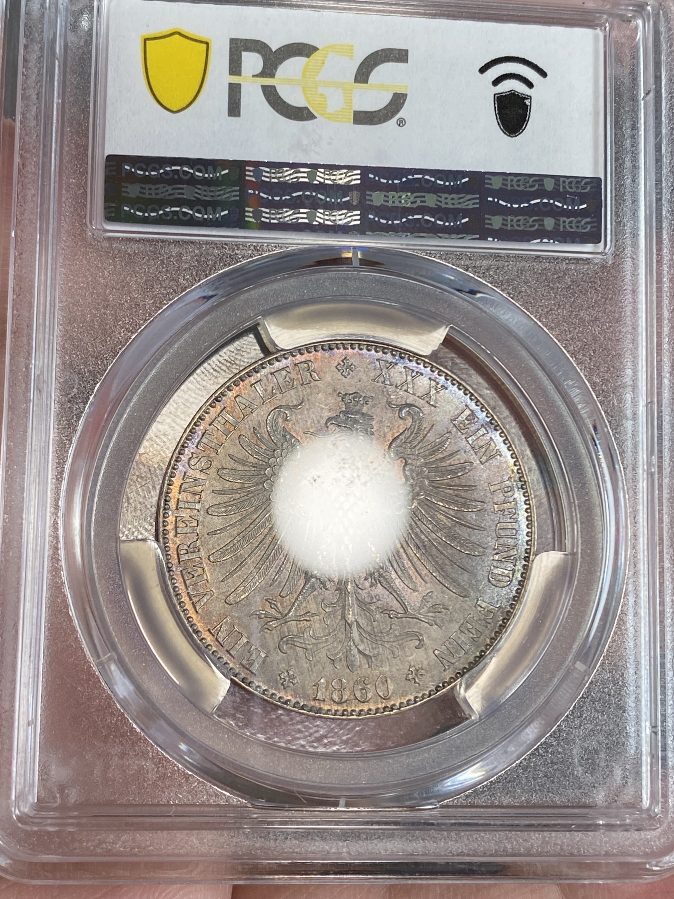 万国钱币拍卖第024期（诸神之战） PCGS MS64 1860年德国法兰克福女神鹰徽流通1泰勒 此版本首年 实物状态蓝金色渐变环彩 实实在在是太漂亮了 一旦上手就放不下来的状态
