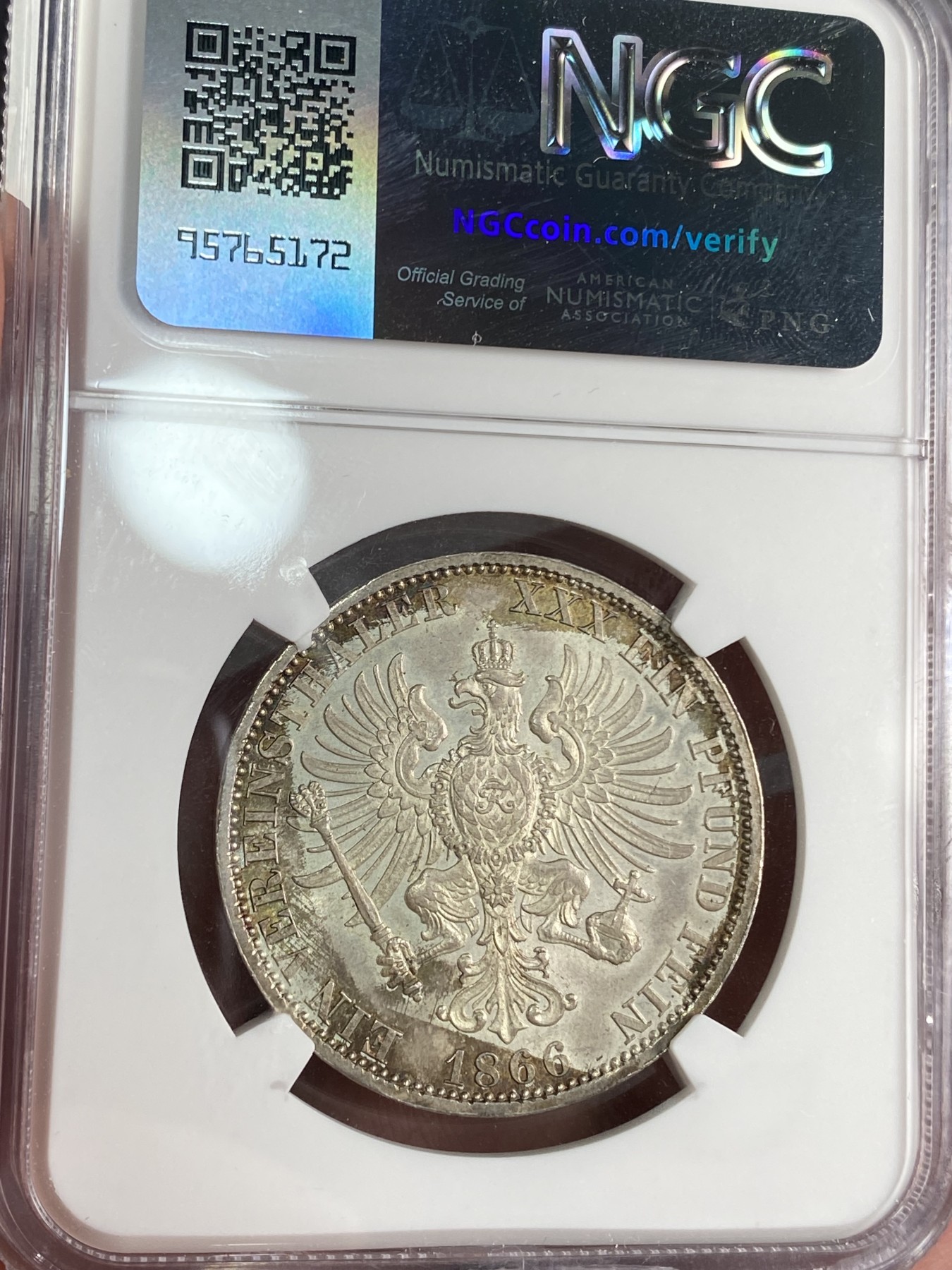 万国钱币拍卖第024期（诸神之战） NGC MS64 1866普鲁士普奥胜利泰勒 青色转光，bu品相。