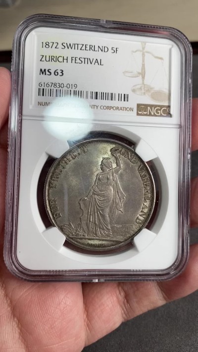 万国钱币拍卖第024期（诸神之战） NGC MS63 1872年瑞士苏黎世射击节5法郎大银币 欧洲青金色包浆 收藏把玩的优质选择