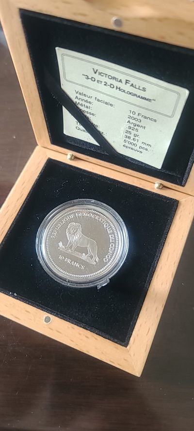 【币将精彩】世界钱币拍卖拍卖（2026-4-22） 老精稀刚果2003年维多利亚瀑布幻彩银币带证书包装
