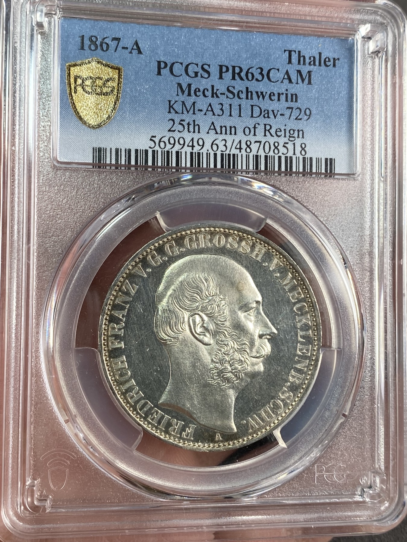 万国钱币拍卖第024期（诸神之战） PCGS PR63CAM 1867德国梅克伦堡精制纹章1泰勒 好品难得的小邦品种，精制CAM更是凤毛麟角，喷砂质感的纹章搭配上镜面感极强的底板实在是赏心悦目。