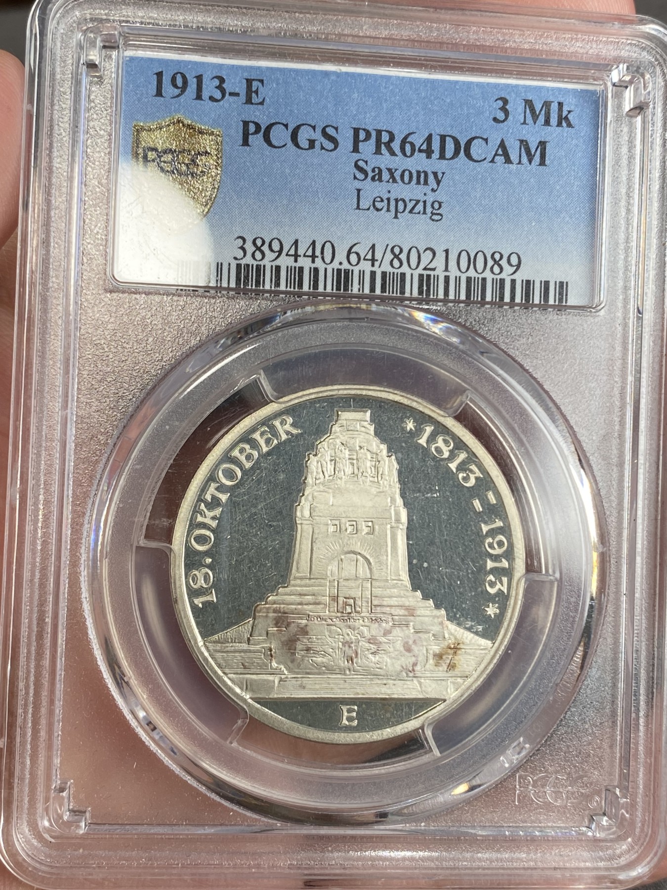 万国钱币拍卖第024期（诸神之战） PCGS PR64DCAM 1913年德国莱比锡民族大会战建功碑精致纪念3马克 完美的黝黑底板与银霜喷砂