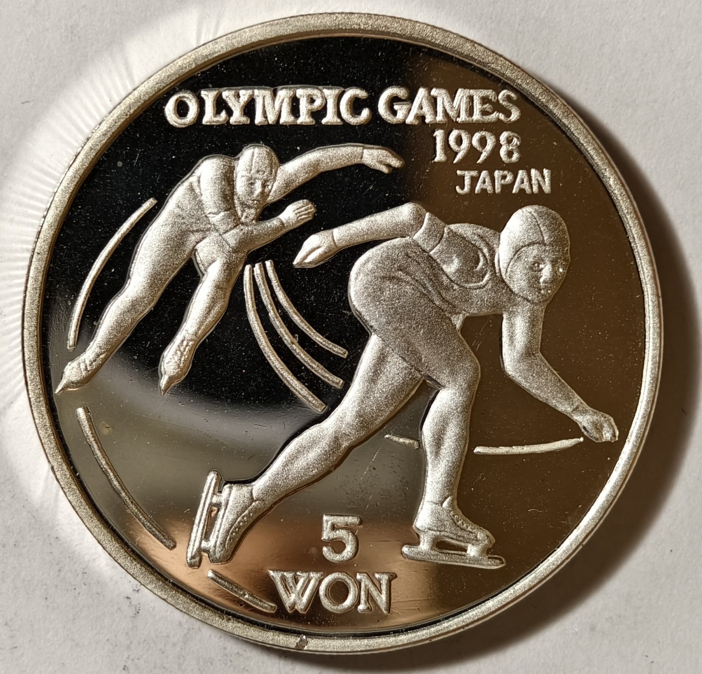 紫瑗钱币——第342期拍卖 朝鲜 1997年 长野冬奥会 短道速滑 5圆 27克 0.999银 精制