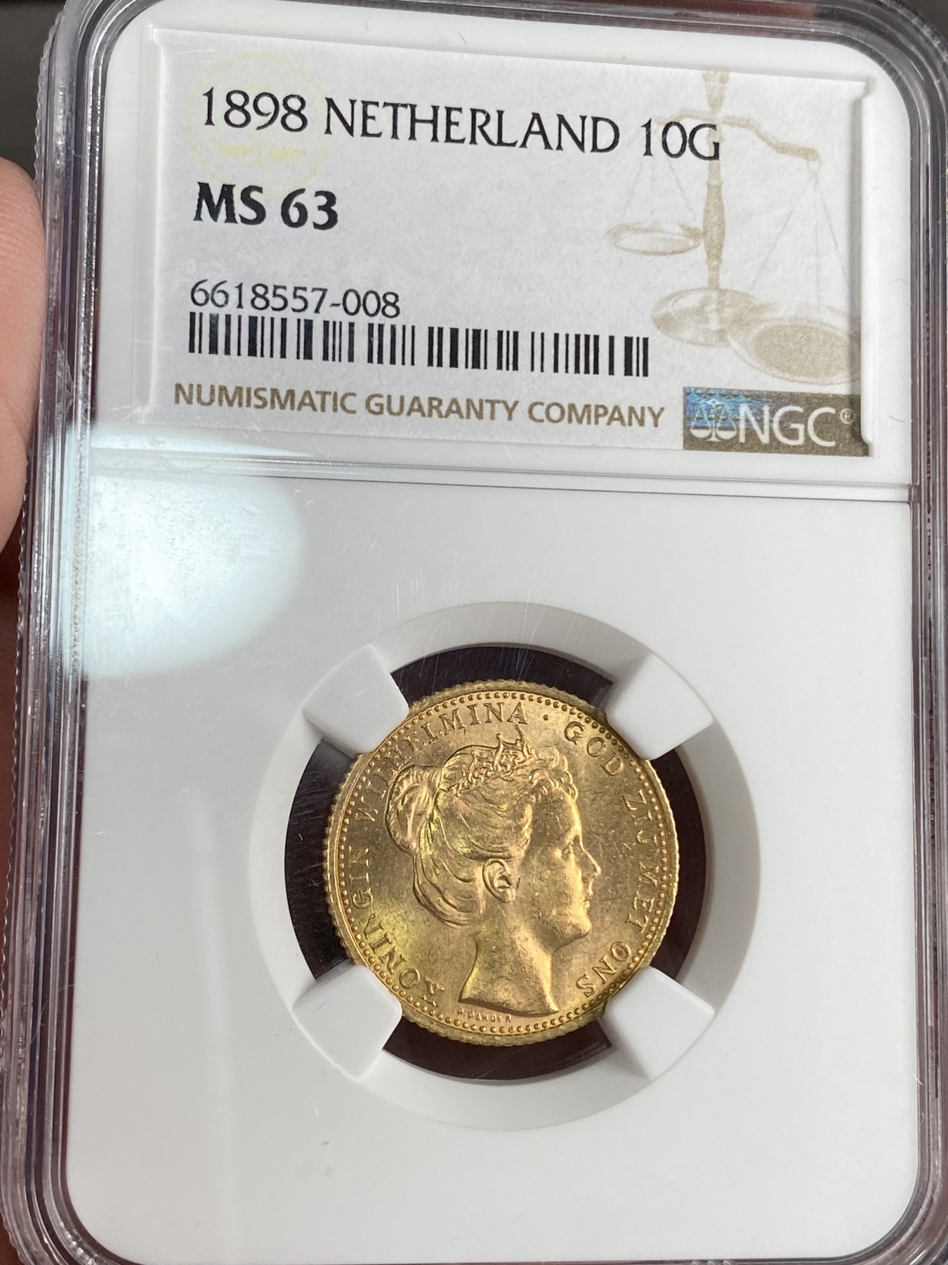 万国钱币拍卖第024期（诸神之战） NGC MS63 1898年荷兰威尔明娜女王少女头像10盾金币 单年发行品种，发行量仅99000枚，原光好品，刚刚结束的AW同分成交价已过万。6.73g，900金。