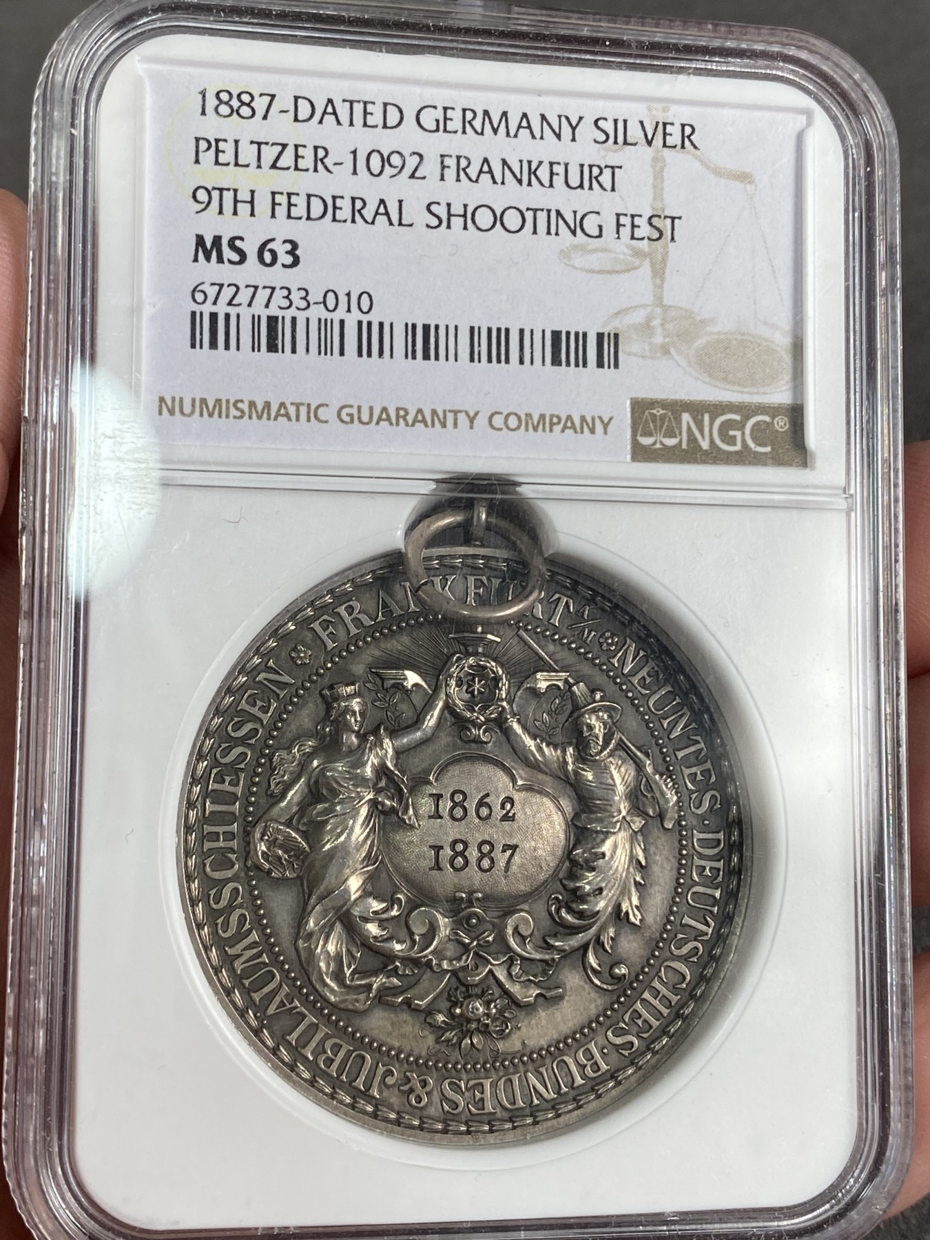 万国钱币拍卖第024期（诸神之战） NGC MS63 1887年德国法兰克福第九届联邦射击节纪念大银章 经典名誉品种 原铸吊环 高点均完美