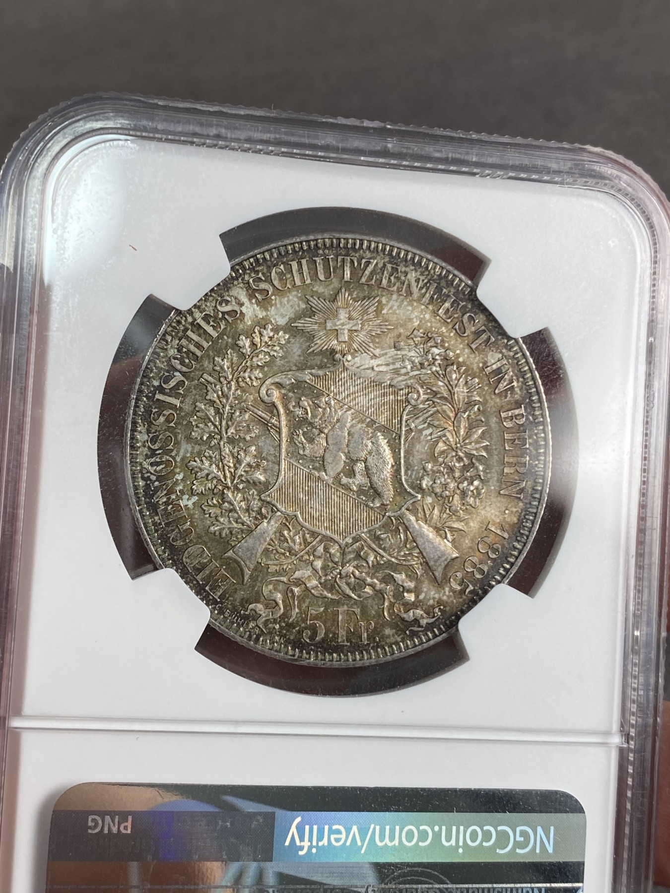 万国钱币拍卖第024期（诸神之战） NGC MS65 1885年瑞士伯尔尼射击节5法郎大银币 经典熊邦射击系列 酱金色包浆非常漂亮