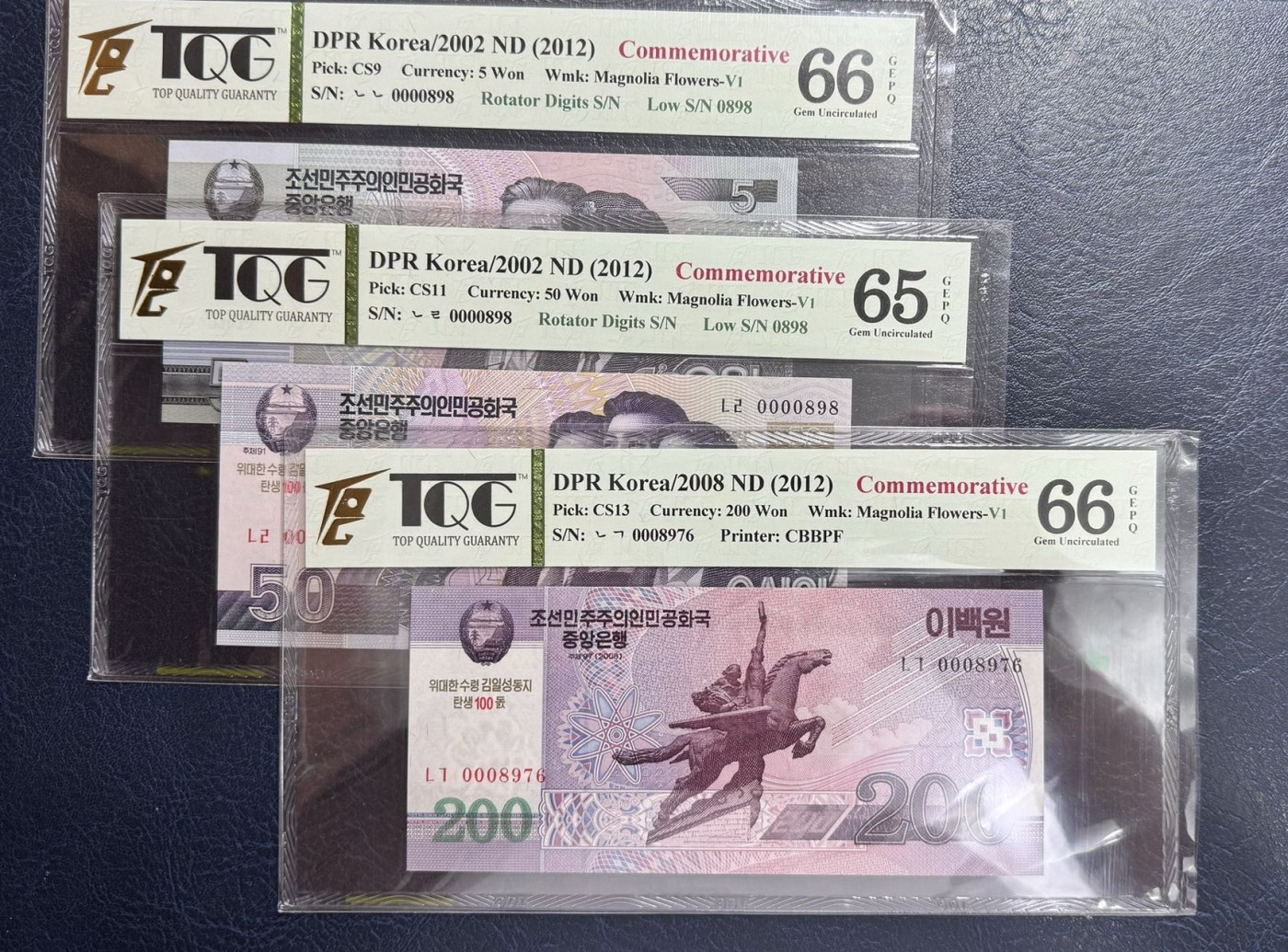 收藏联盟Quantum Auction 第340期拍卖  朝鲜2012年5-5000元金日成诞辰100周年纪念（含证书） TQG 65-66 GEPQ/D 多数为百位号 个别全同号，倒置号 细节如图