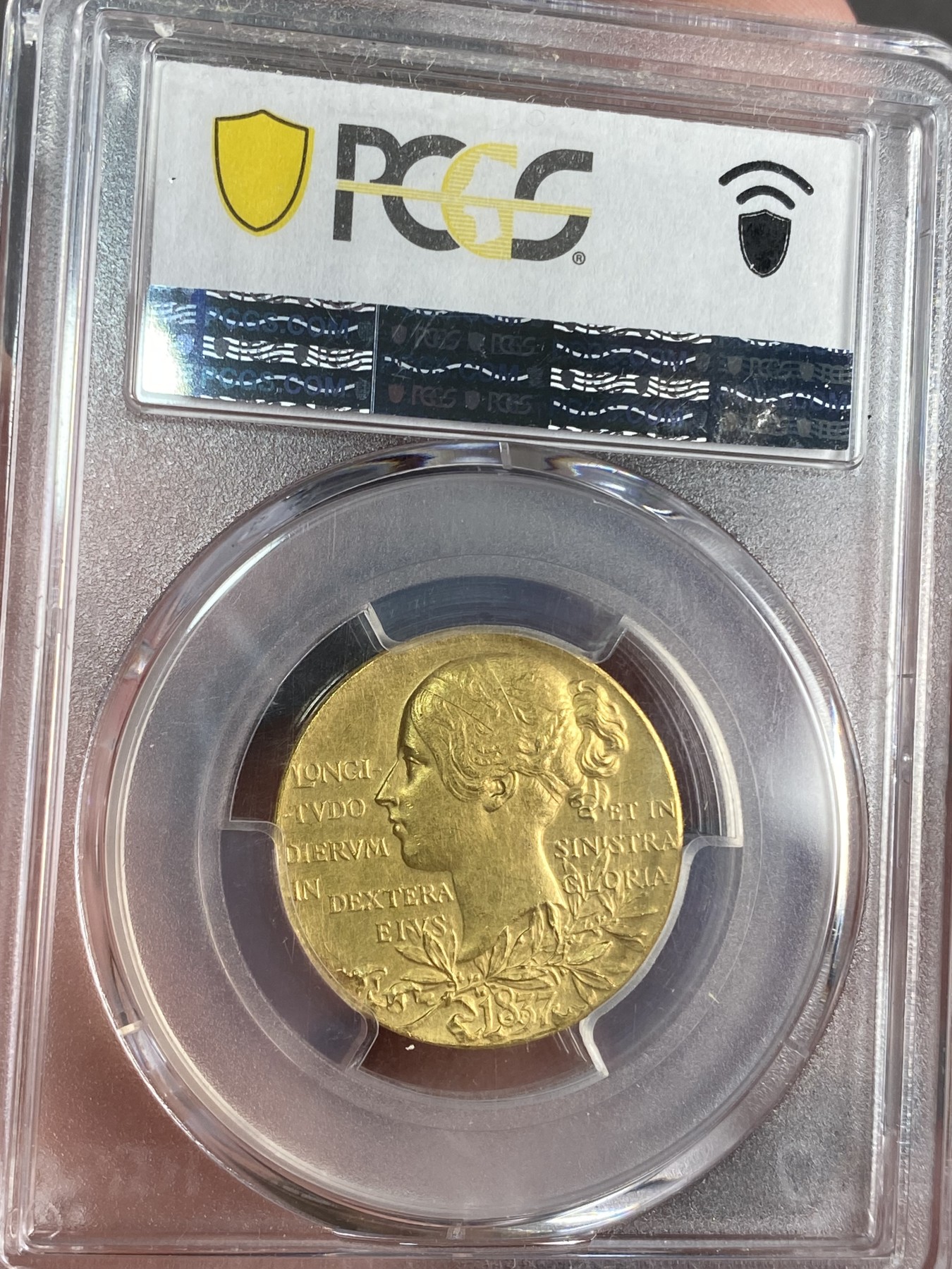 万国钱币拍卖第024期（诸神之战） PCGS SP58 1897年英国维多利亚登基60周年纪念金章 12.96g 精制matte工艺，价格起飞的品种。