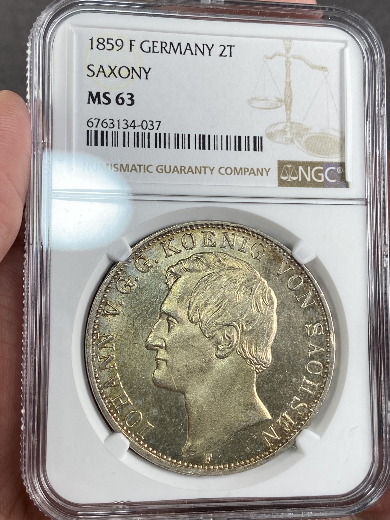 万国钱币拍卖第024期（诸神之战） NGC MS63 1859年德国萨克森大纹章2泰勒 金彩环绕 银霜十字转光极强 亚军分 可直接入藏终身的一枚