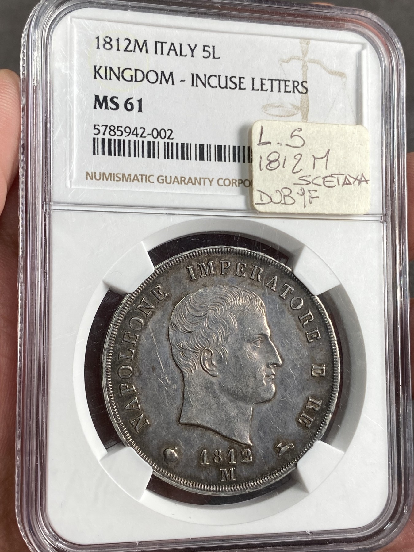 万国钱币拍卖第024期（诸神之战） NGC MS61 1812拿占意大利王国5里拉 米兰厂铸造，双面黑包浆，细节完好，难得好品。