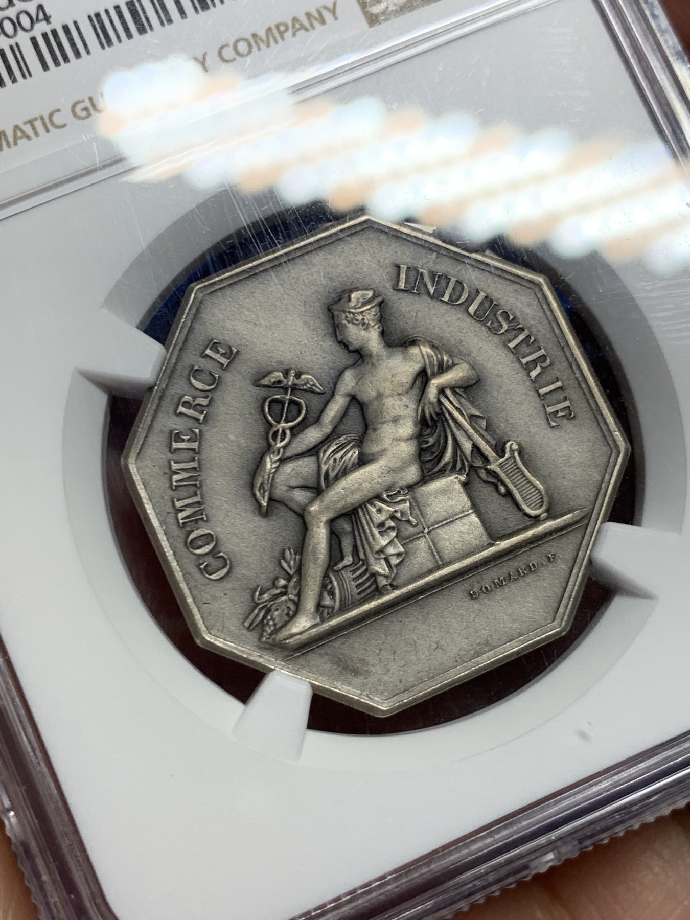 《竞宝斋》第262场-周日，周一，周二 3场连拍 (全场包邮) NGC MS64 法国卡尔卡松商业公司八角银质代币，商业之神墨丘利背面丰饶角