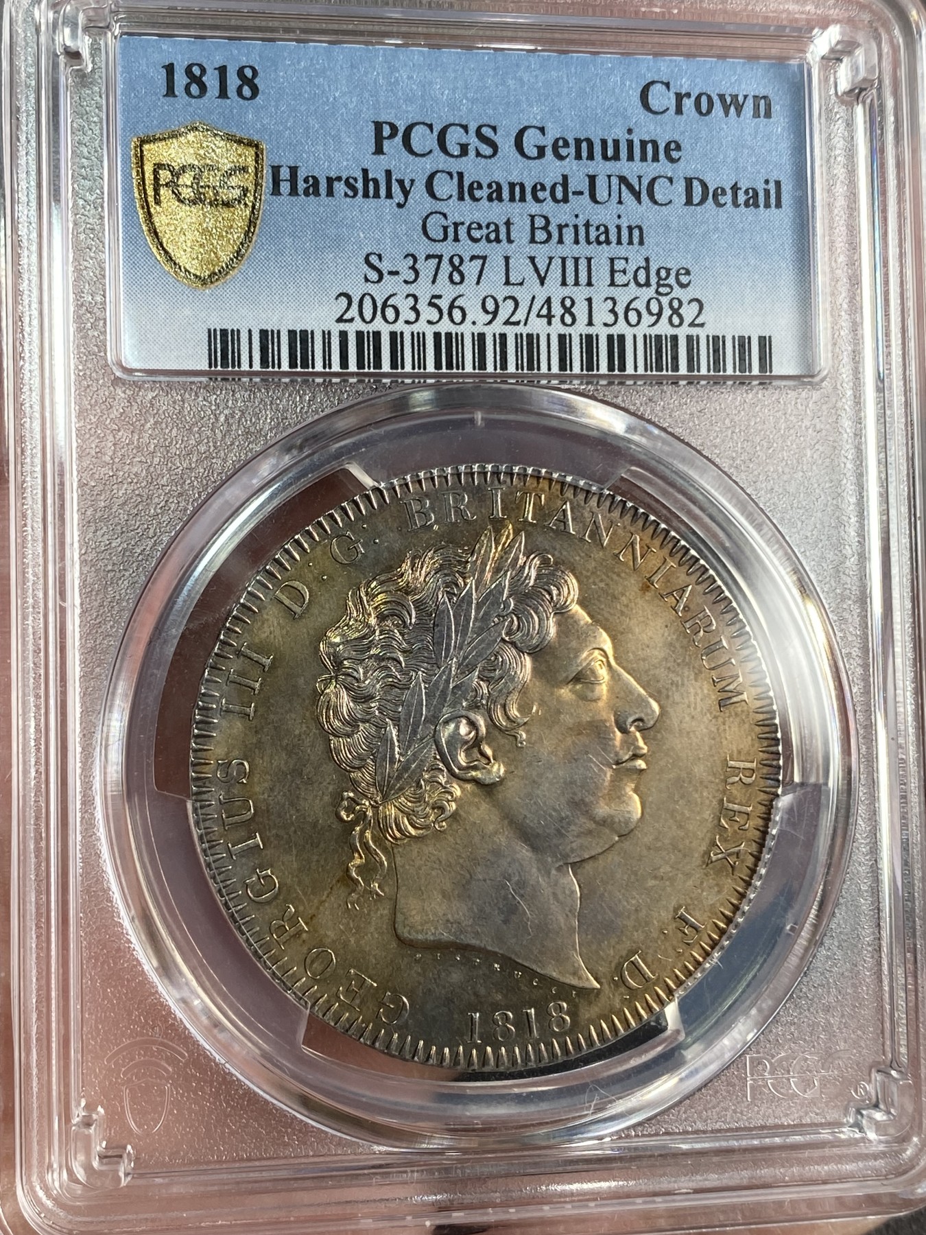 万国钱币拍卖第024期（诸神之战） PCGS UNCD 1818年英国乔治三世屠龙1克朗大银币 均匀金色包浆裹身 高点也有很优质的表现 