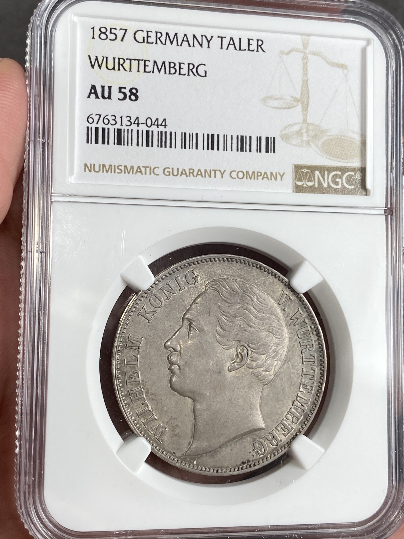 万国钱币拍卖第024期（诸神之战） NGC AU58 1857年德国符腾堡狮鹿盾徽流通1泰勒 原味环彩状态 AU中的佼佼者