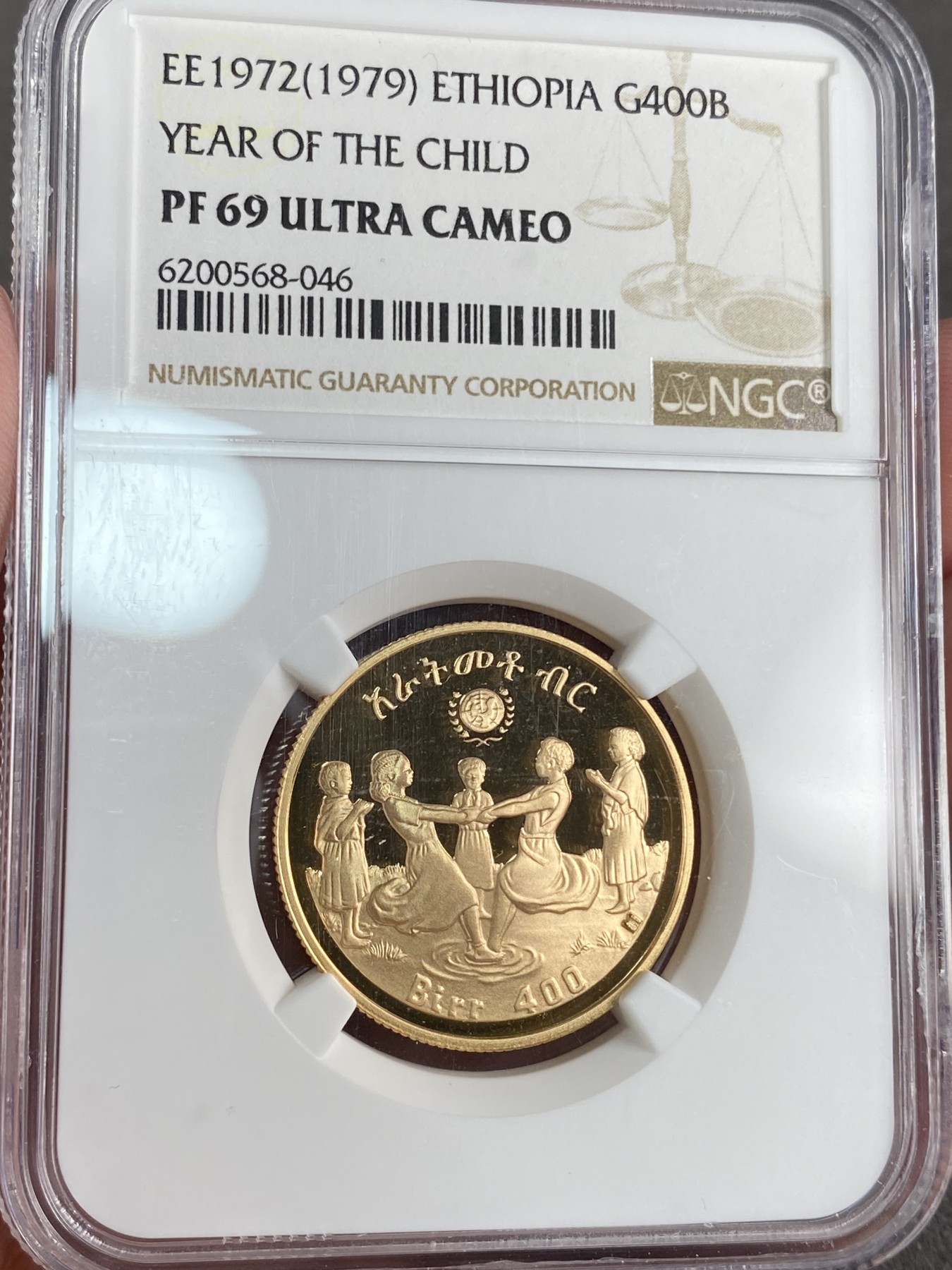 万国钱币拍卖第024期（诸神之战） NGC PF69UC 1979年埃塞俄比亚儿童年400比尔金币 顶级品相，17.17g，900金。