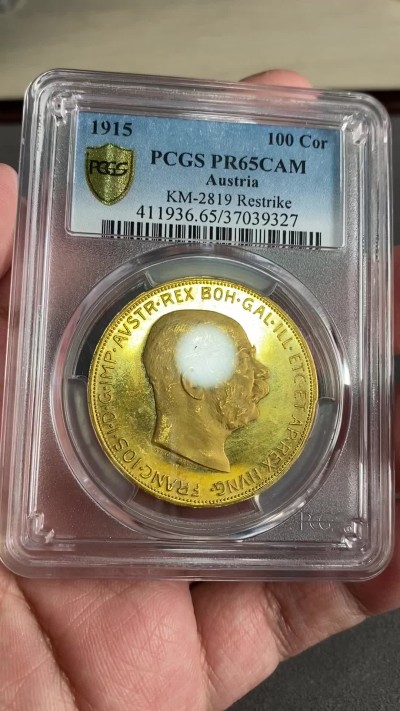 万国钱币拍卖第024期（诸神之战） PCGS PR65CAM 1915（后铸）奥地利精制100克朗金币 完美镜面状态，33.88g，900金。