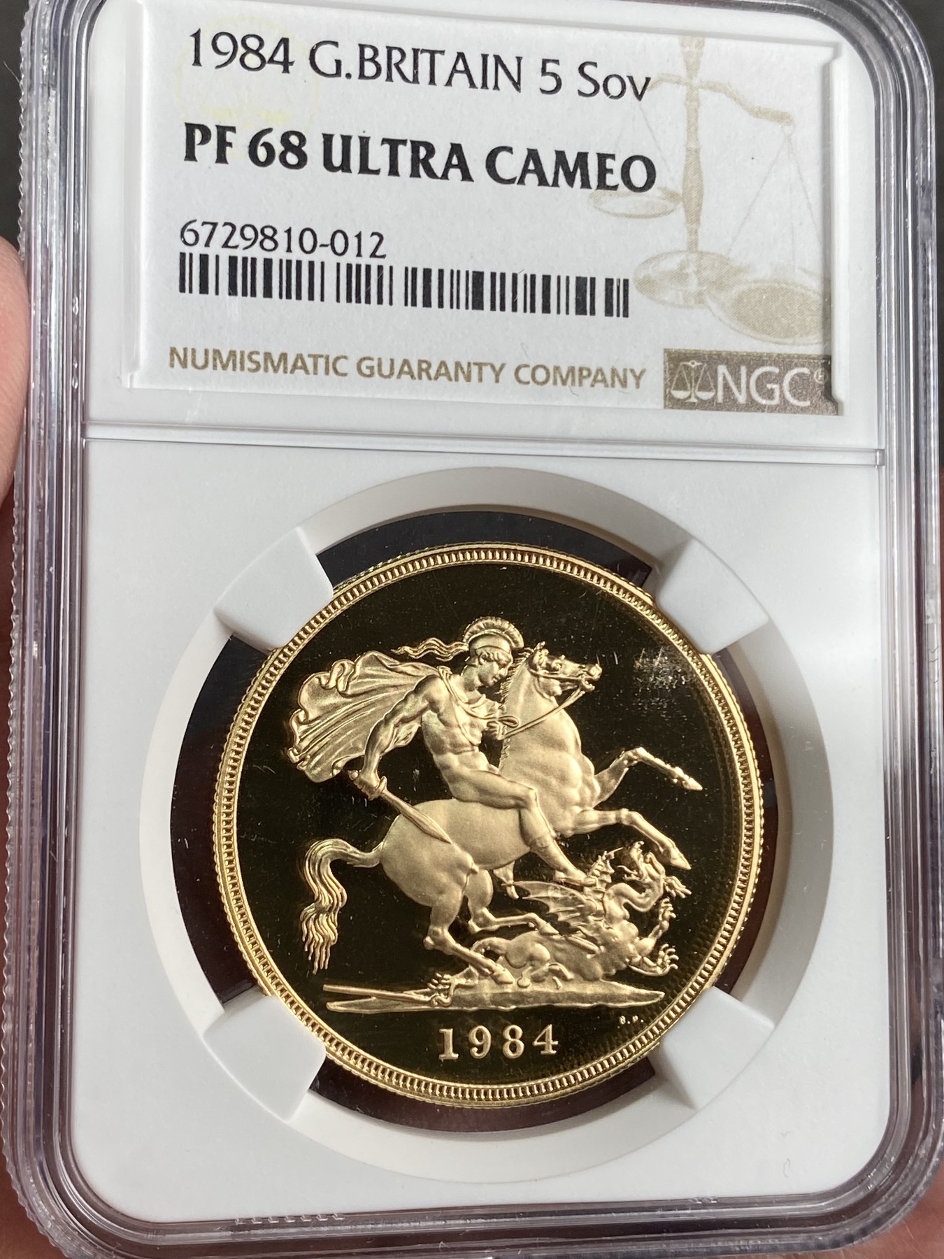 万国钱币拍卖第024期（诸神之战） NGC PF68UC 1984英国伊丽莎白二世5镑大金币 39.9g，917金。