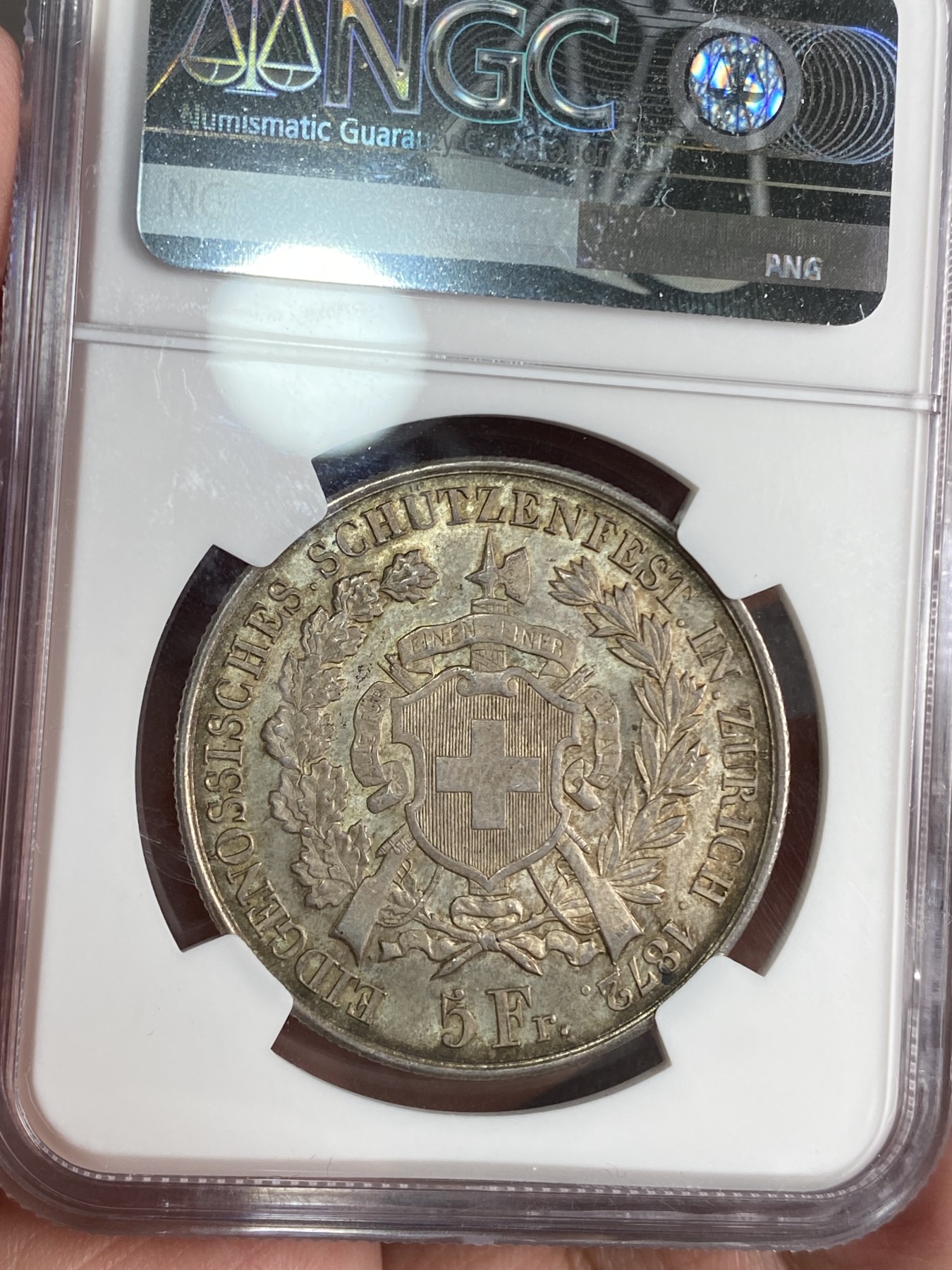 万国钱币拍卖第024期（诸神之战） NGC MS63 1872年瑞士苏黎世射击节5法郎大银币 欧洲青金色包浆 收藏把玩的优质选择