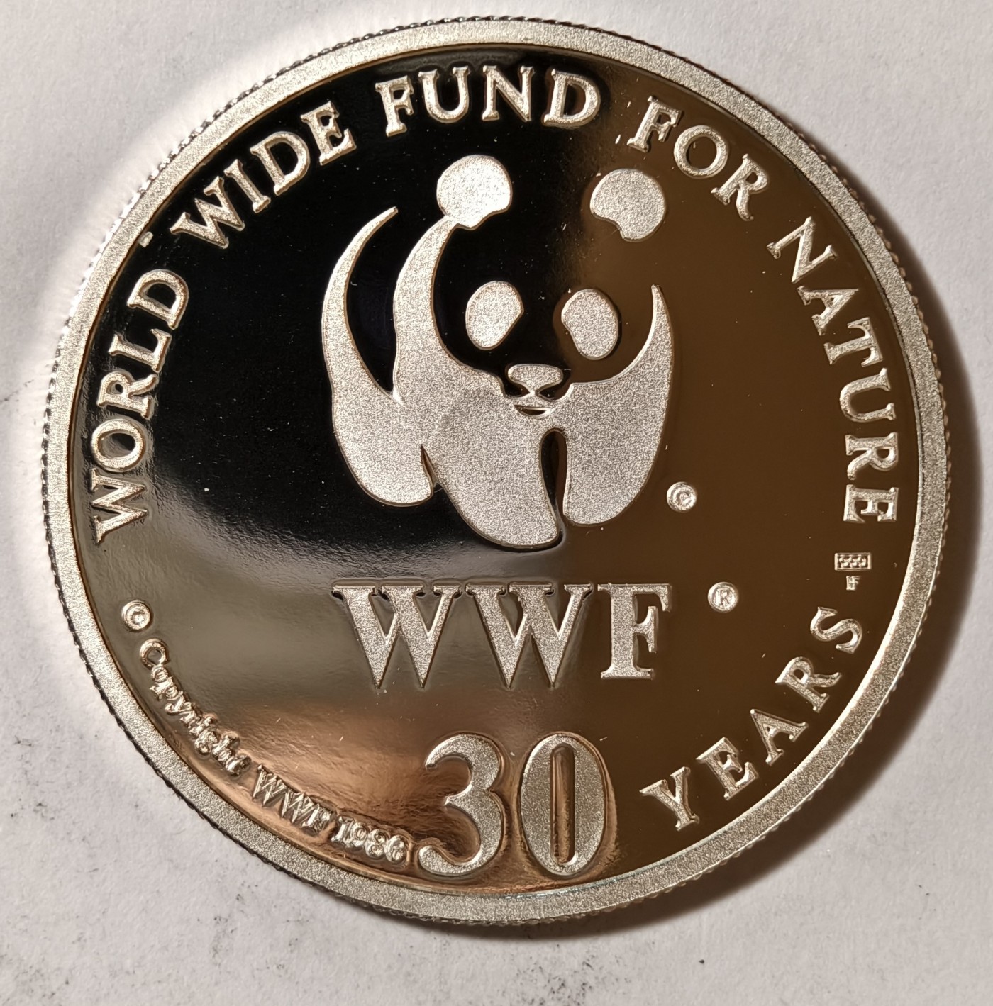 紫瑗钱币——第342期拍卖 联合国 1986年 WWF野生基金会30周年 僧海豹 纪念章 20克 0.999银 精制