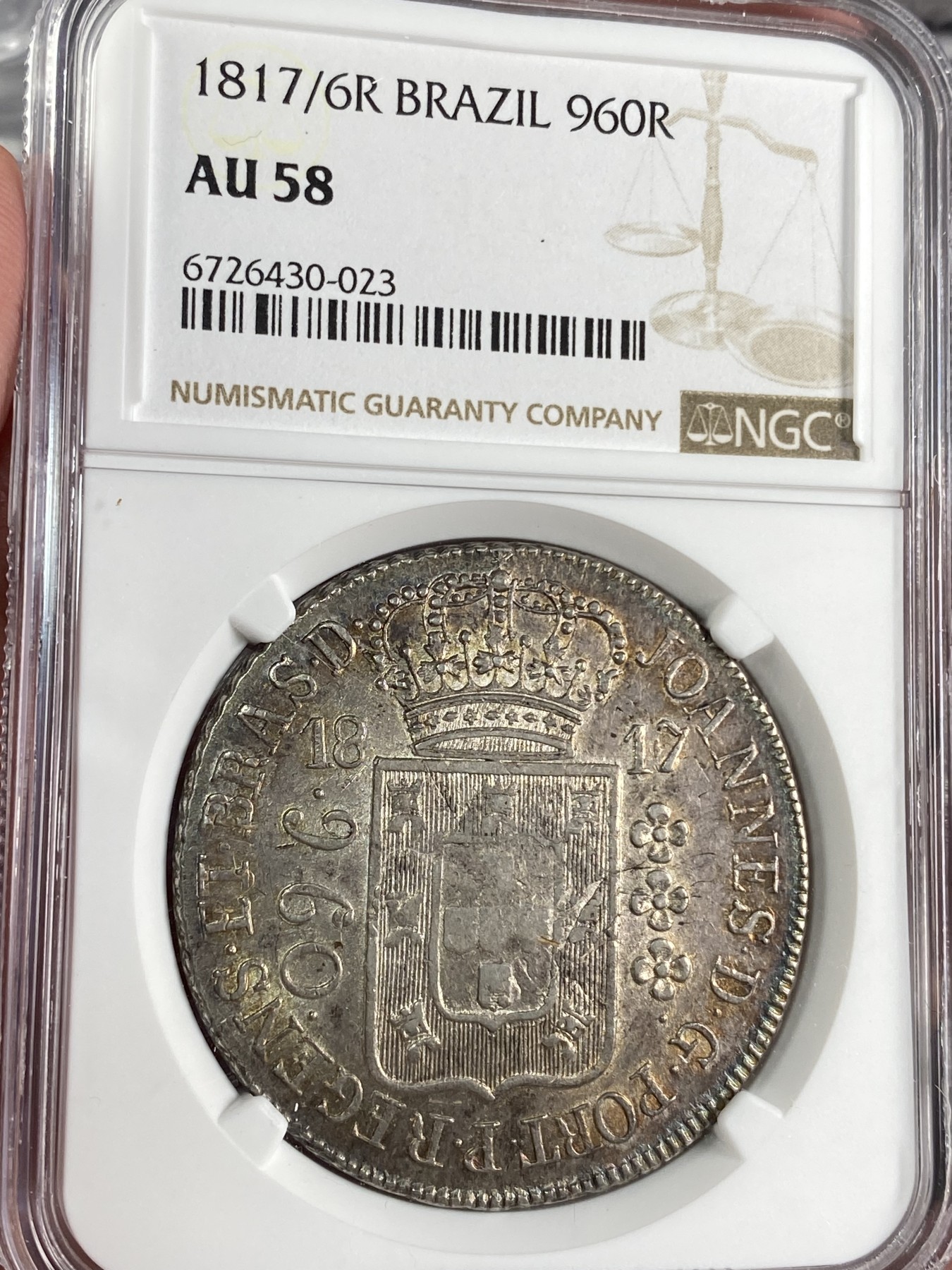 万国钱币拍卖第024期（诸神之战） NGC AU58 1817/6年巴西骑字960R地球大银币 环五彩欧洲包浆 此年份骑字总共评级4枚 唯一冠军分