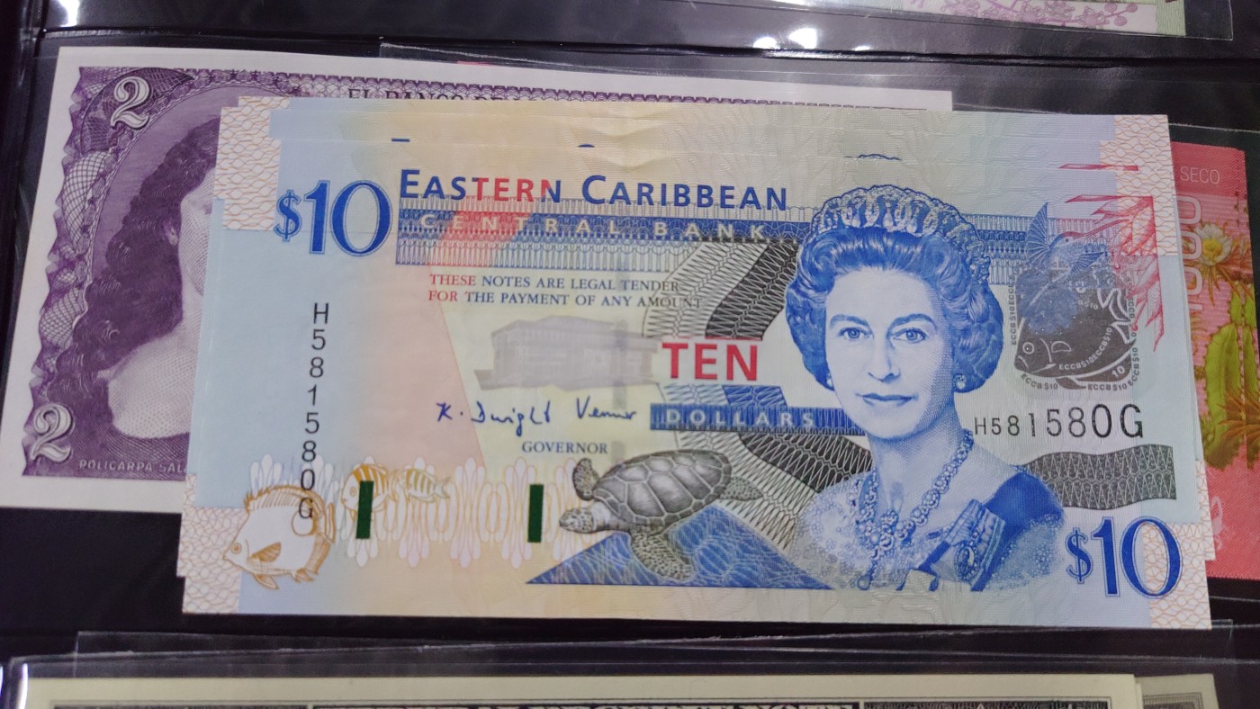 【世界钱币】精选微拍第102期暨2024年第13期  部分卖剩货品继续拍 东加勒比10元 H～G冠全新绝品无47尾号580