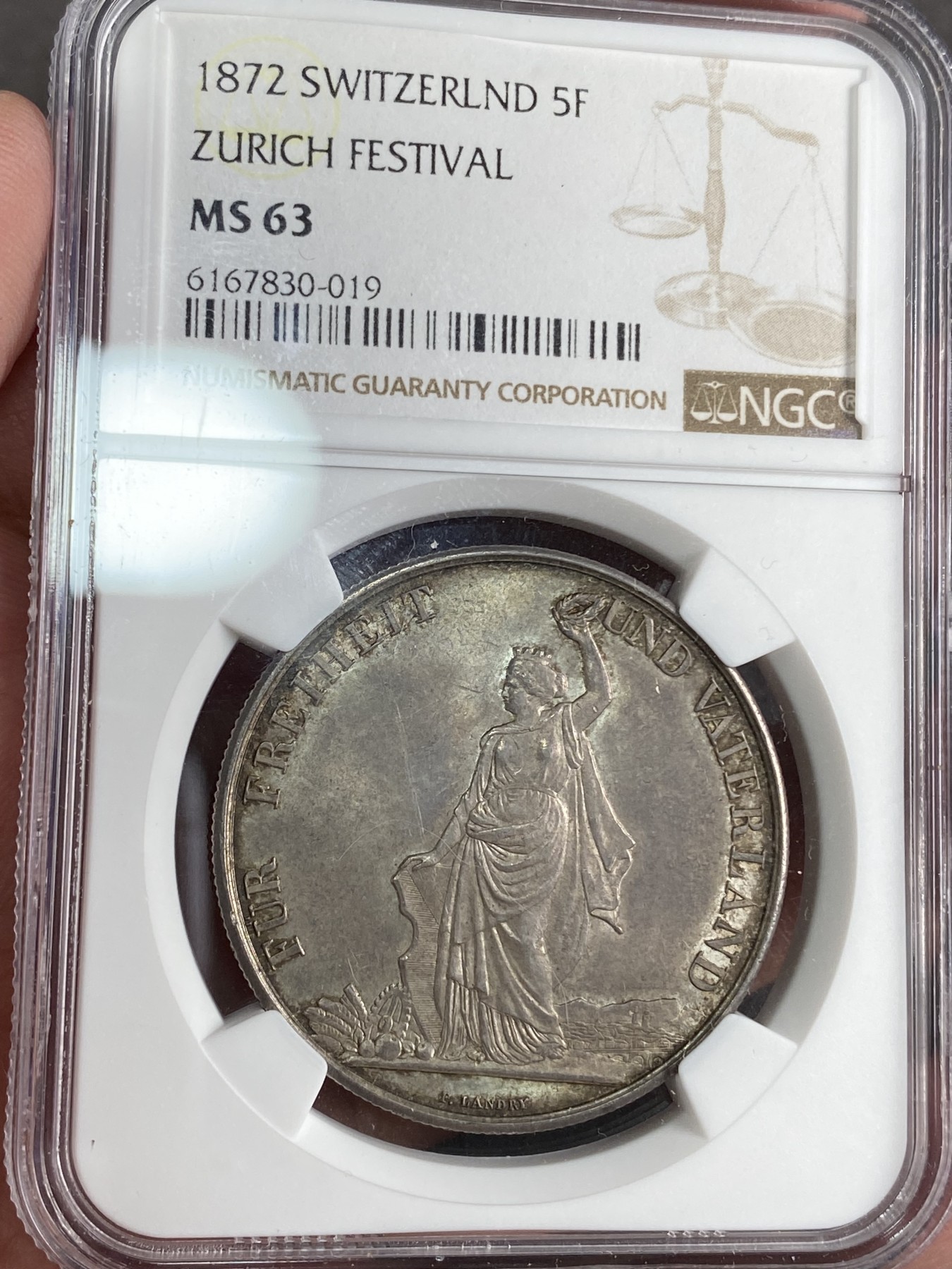 万国钱币拍卖第024期（诸神之战） NGC MS63 1872年瑞士苏黎世射击节5法郎大银币 欧洲青金色包浆 收藏把玩的优质选择