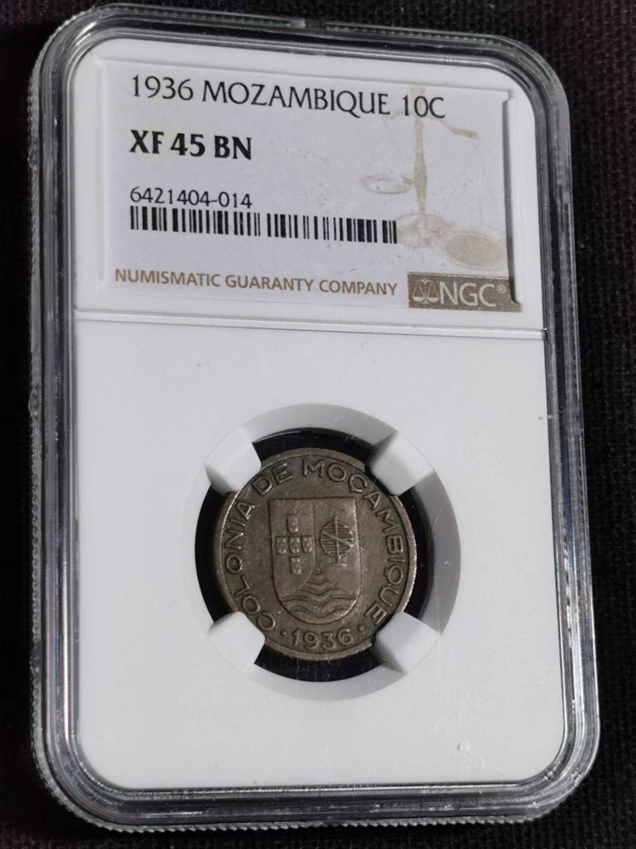 刘世昌艺术品销售中心～虎踞龙蟠*金杨在线联拍群第510期 莫桑比克1936年10分硬币（NGC XF45BN 串号：6421404-014）1枚。