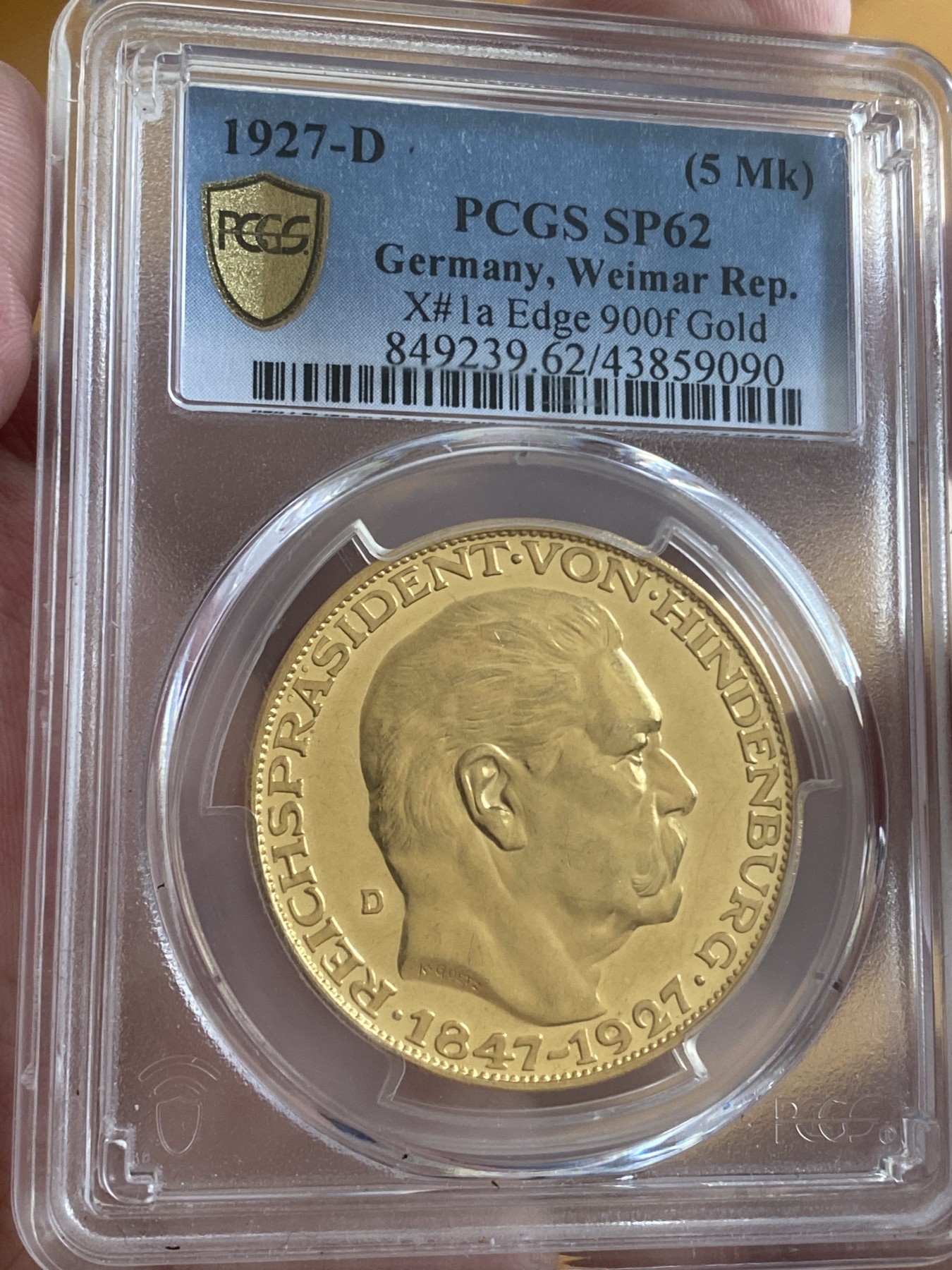 万国钱币拍卖第024期（诸神之战） PCGS SP62 1927年德国魏玛共和国兴登堡总统80大寿金质5马克币章 卡尔哥茨设计，大名誉品种，高点无损，底板镜面，22.4g大型金章，收藏与抗风险佳品，22年条顿堡裸章成交价约2.5万。