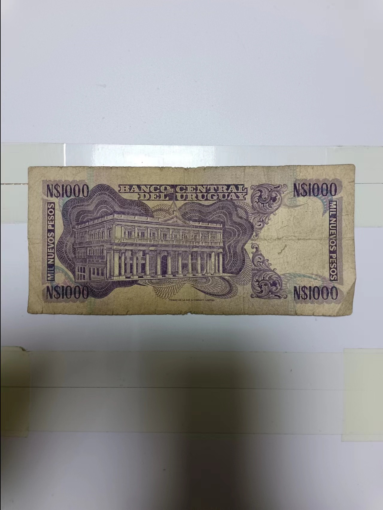 【20230427】非全新纸币第132场 乌拉圭1000比索，有裂缝