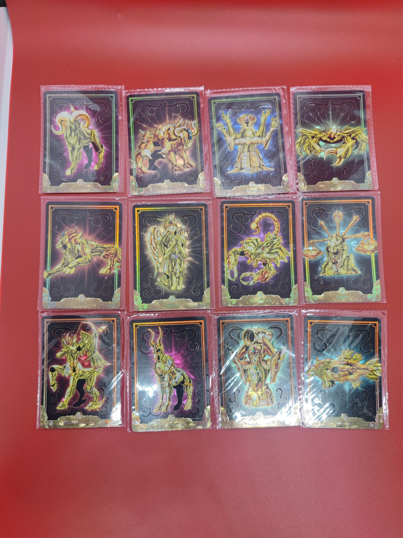 妖精的尾巴卡牌拍卖第十六期(收拍品) 卡游圣斗士，十二黄金圣衣一套，原膜