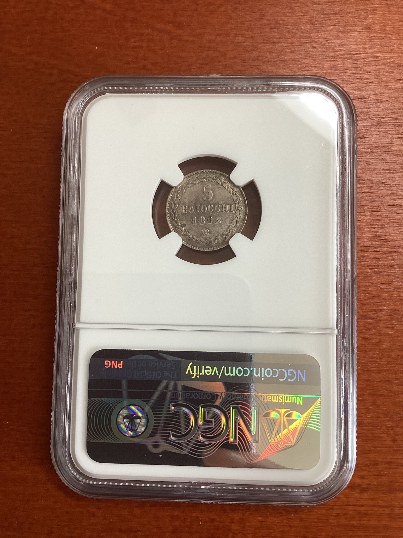长老汇龙年精选第四场 1862R XVII 意大利教皇国 5B银币，NGC MS64分，唯一冠军分，远远领先第二名53分，克书XF40标价150美金，镜面感十足