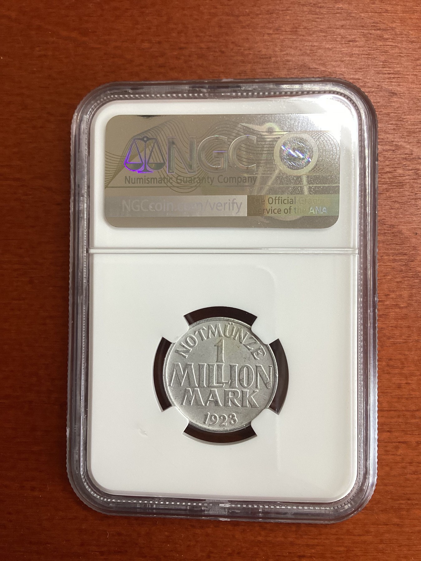 长老汇龙年精选第四场 1923 德紧门登1百万马克铝币，NGC MS63分，季军分，更高分仅有14枚