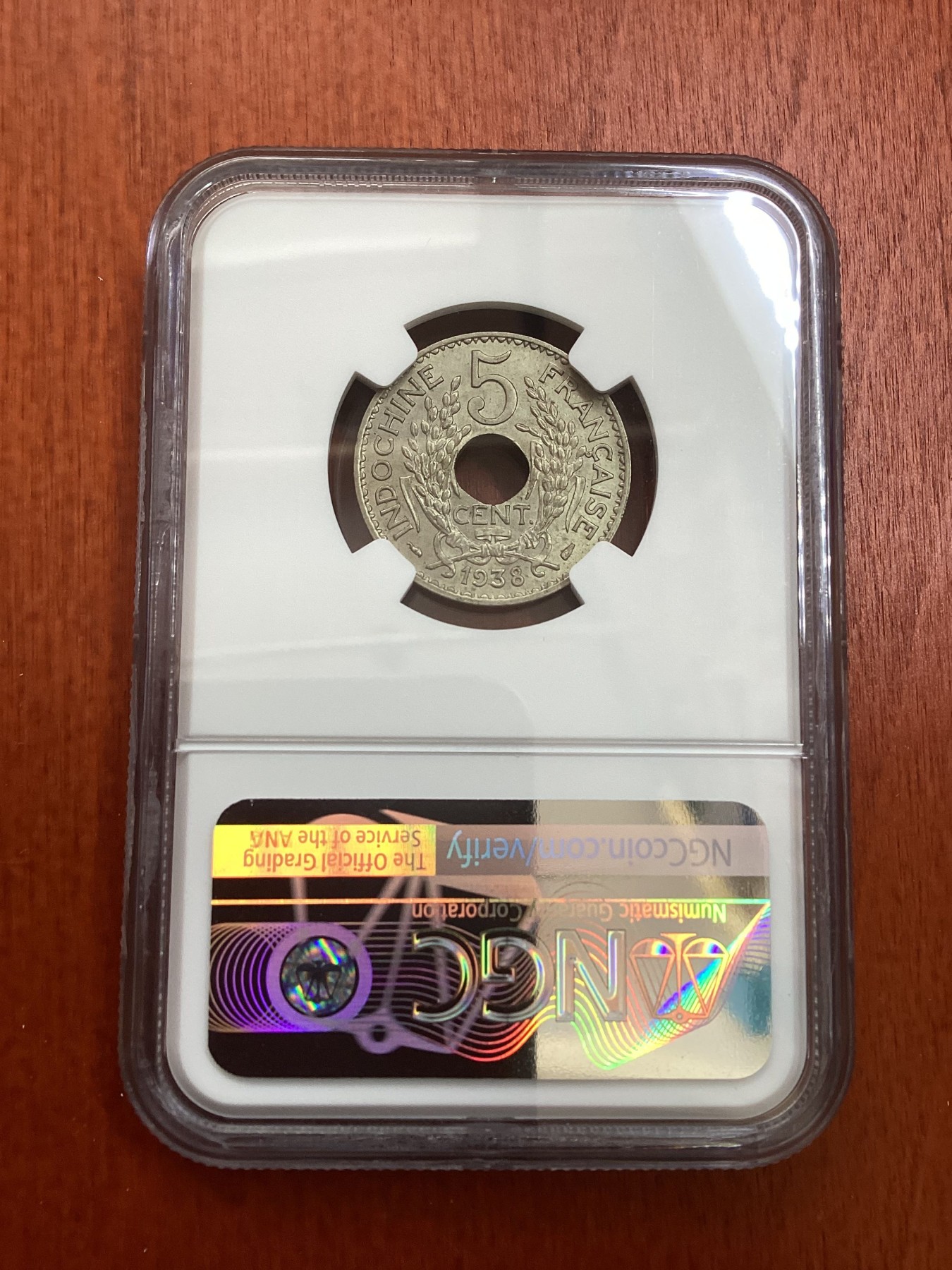 长老汇龙年精选第四场 1938 法属印度支那5分中孔铜镍币，NGC MS63分