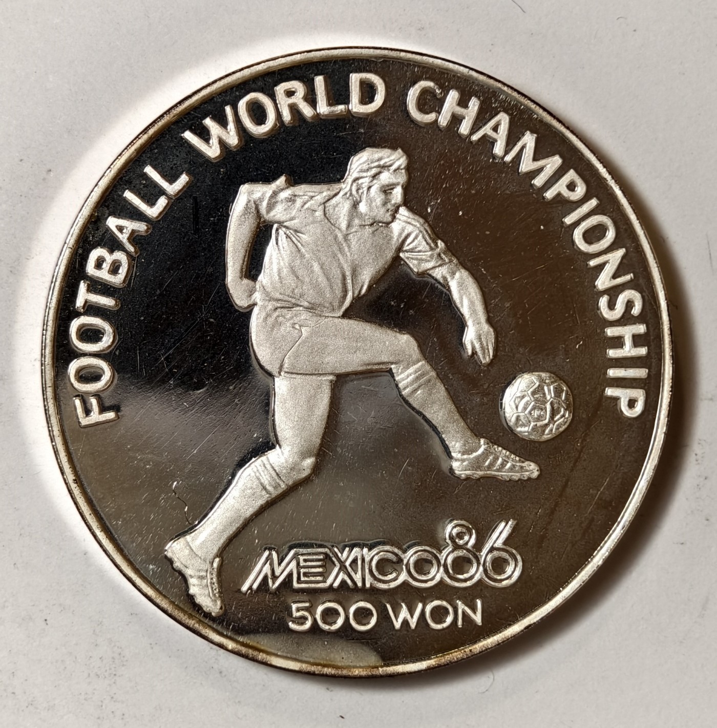 紫瑗钱币——第344期拍卖 朝鲜 1987年 86墨西哥世界杯 带球 500圆 27克 0.999银 精制