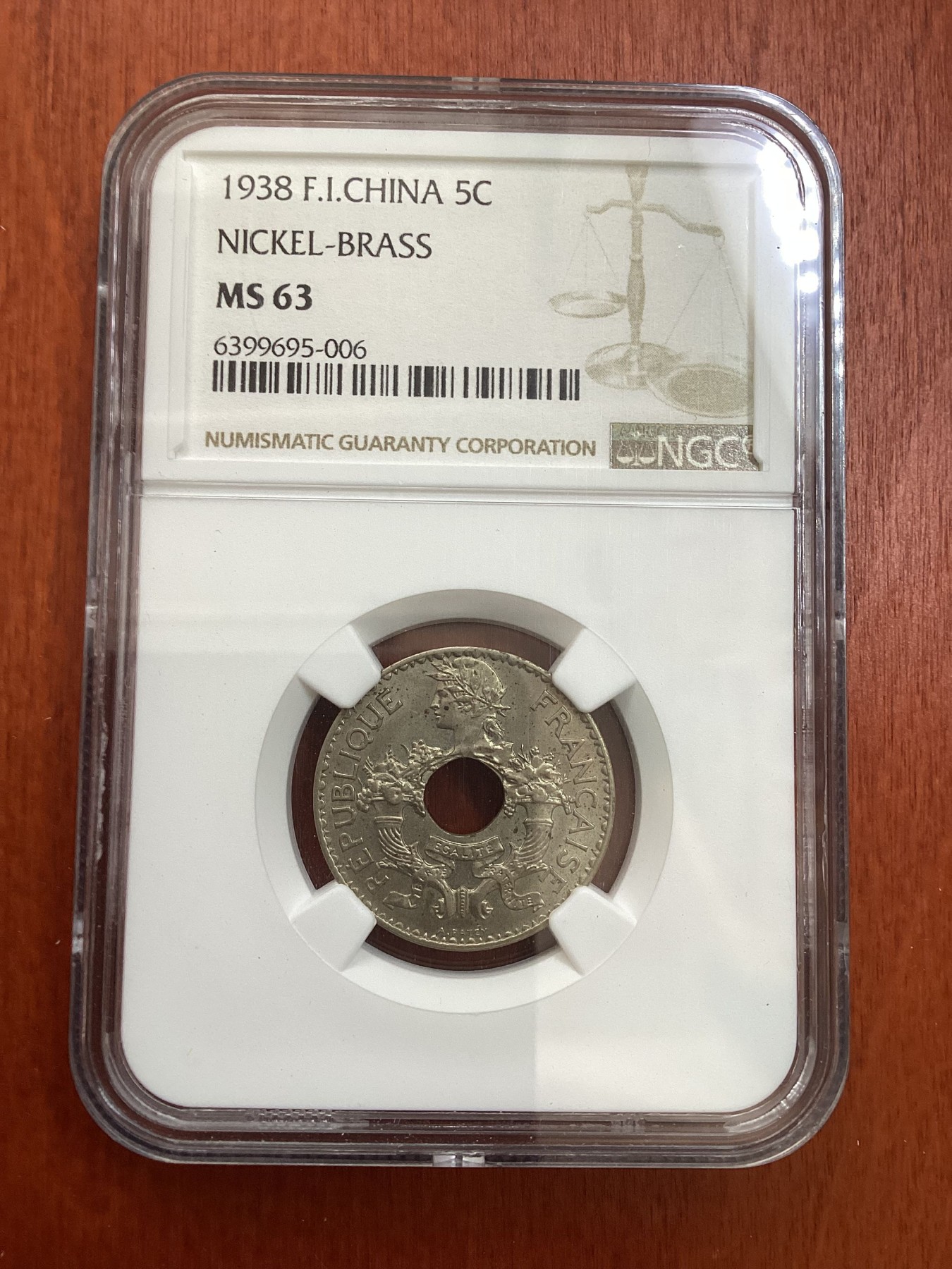 长老汇龙年精选第四场 1938 法属印度支那5分中孔铜镍币，NGC MS63分