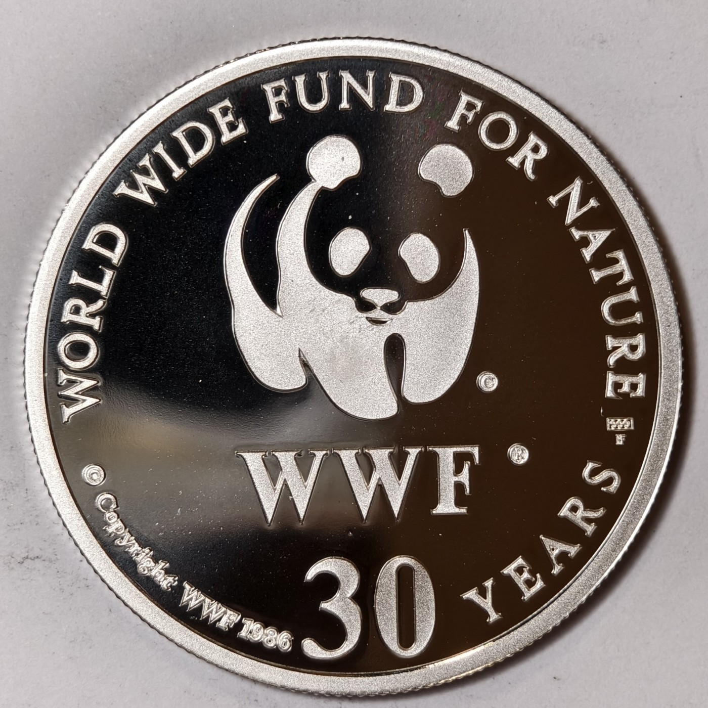 紫瑗钱币——第344期拍卖 联合国 1986年 WWF野生基金会30周年 肉垂鹤 纪念章 20克 0.999银 精制