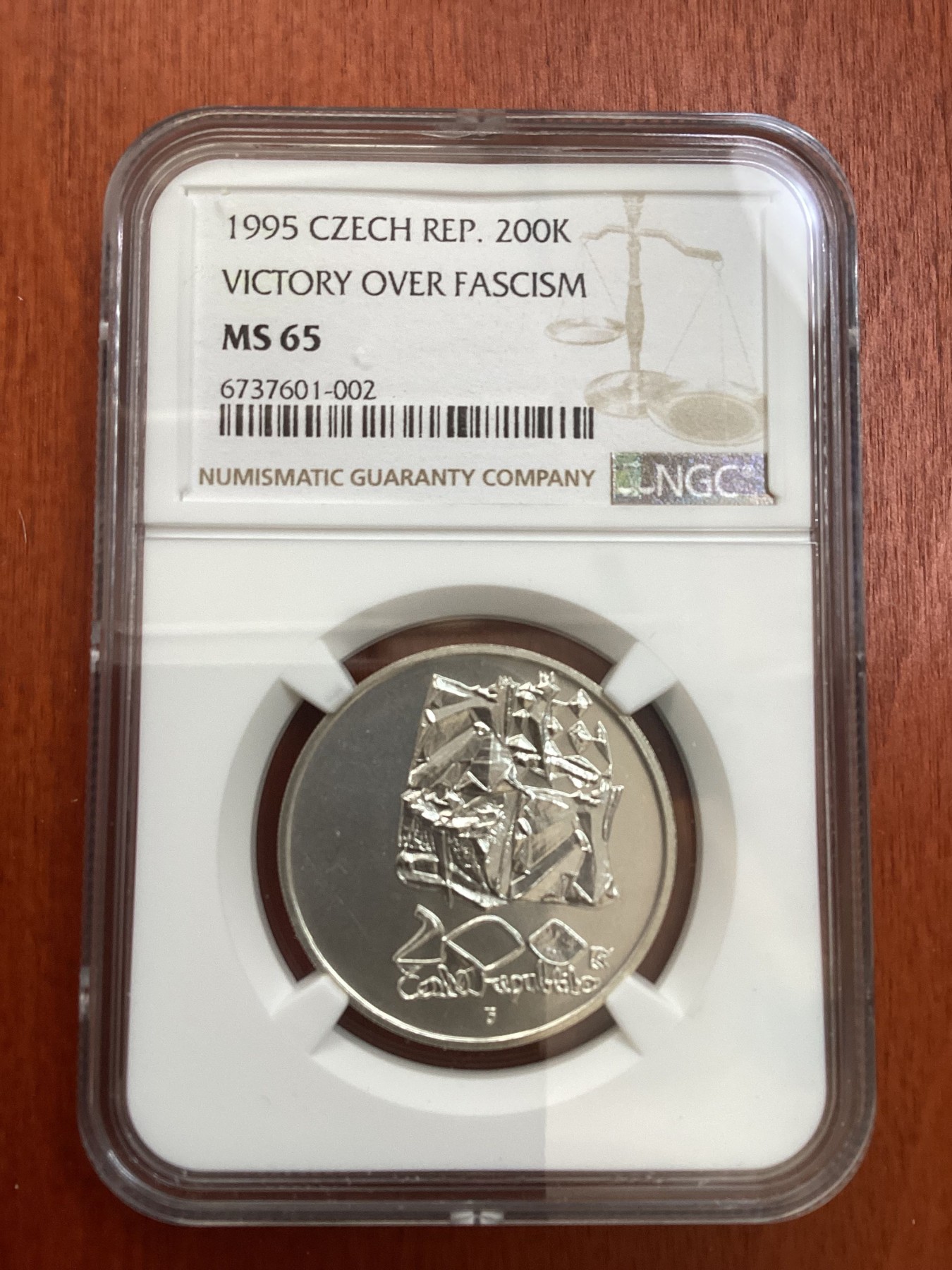 长老汇龙年精选第四场 1995 捷克战胜法西斯200克朗银币，NGC MS65分，唯一冠军分，1997年5830枚销毁，少见，冠军分外网基本2000元往上