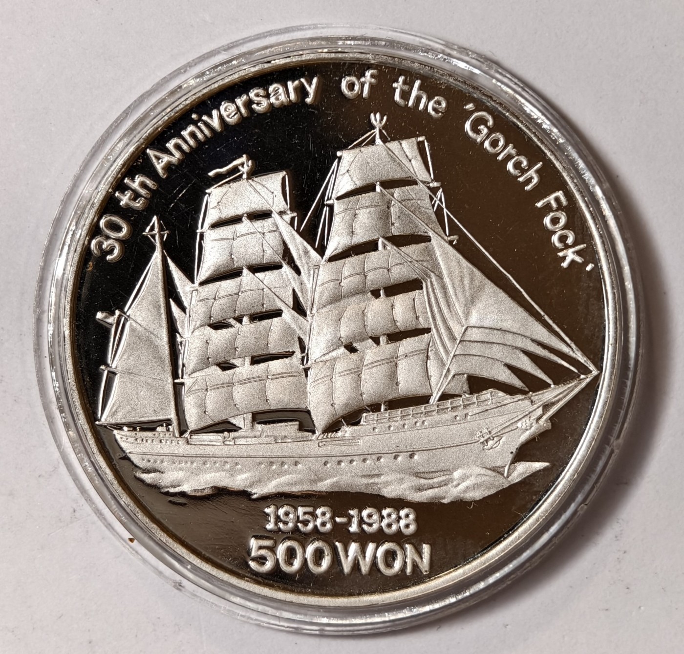 紫瑗钱币——第344期拍卖 朝鲜 1988年“格罗奇.福克”帆船30周年 500圆 27克 0.999银 精制
