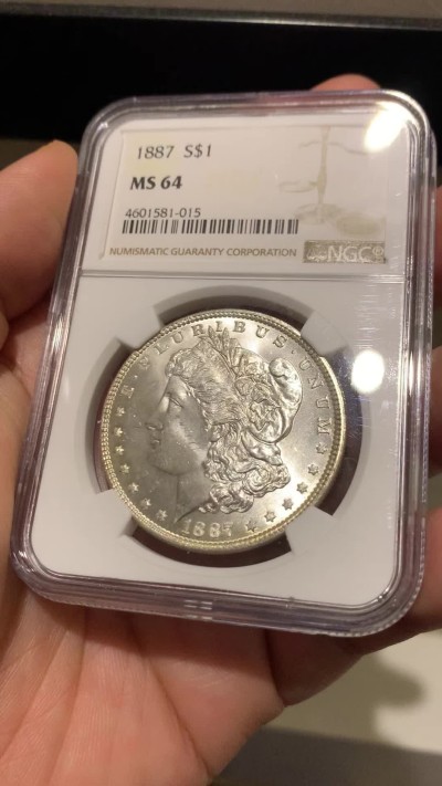 《竞宝斋》第263场-周日，周一 2场连拍 (全场包邮) NGC MS64 美国1887年摩根银币