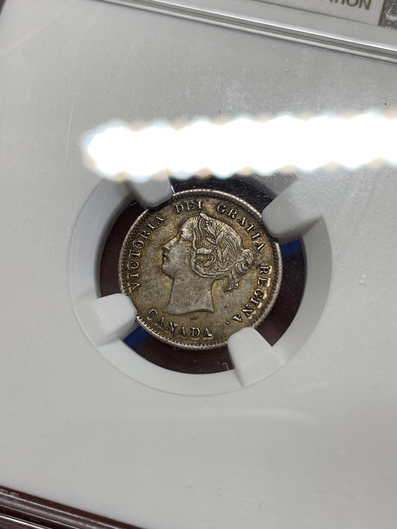 《竞宝斋》第263场-周日，周一 2场连拍 (全场包邮) NGC AU55 加拿大1870年小维5分银币，925银，独特的小维年轻头像。早期的加拿大小维出分都难得，60分书价250美元，更高分仅有3枚。