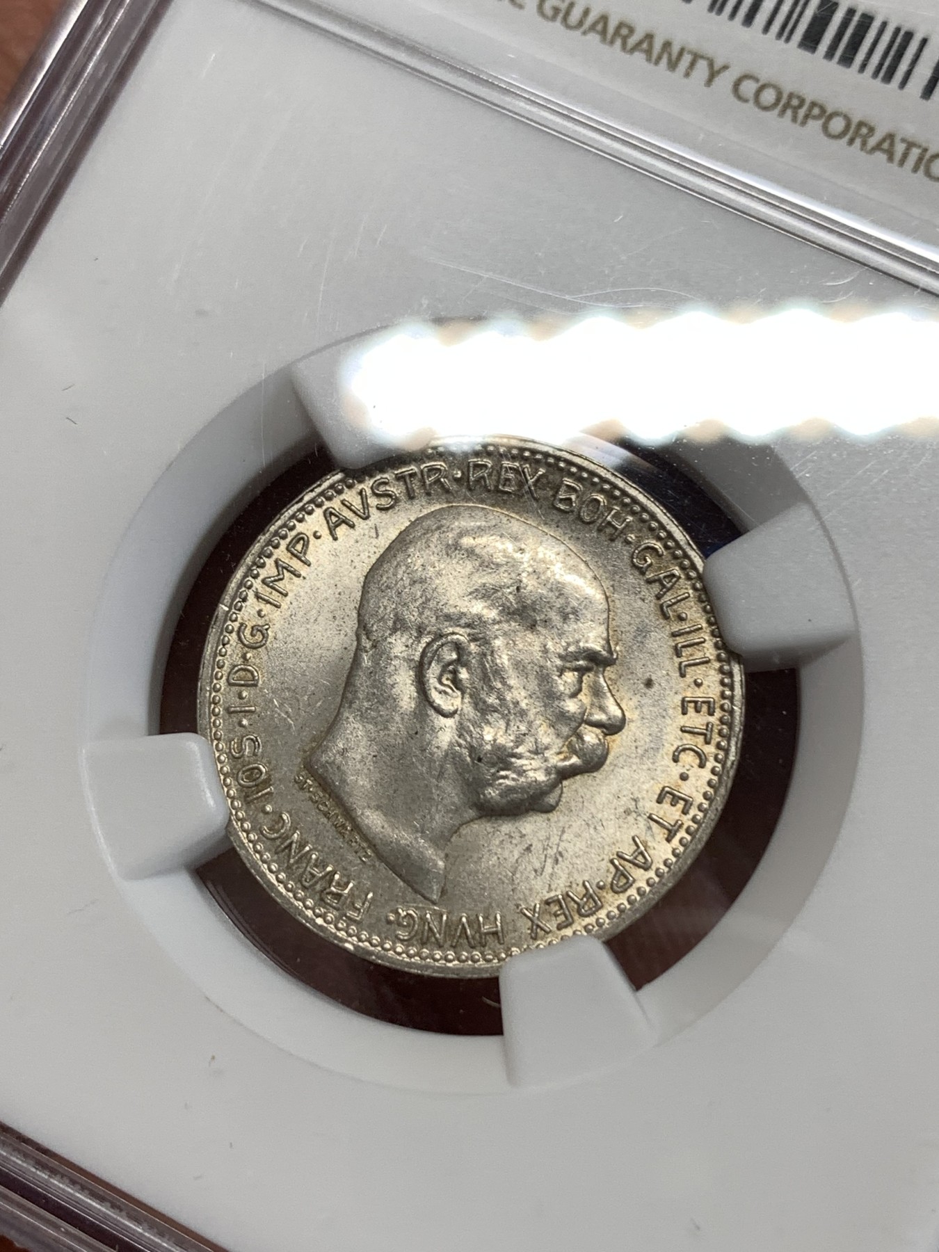 《竞宝斋》第263场-周日，周一 2场连拍 (全场包邮) NGC MS63 奥匈帝国1915年约瑟夫一世1克朗银币，金色包浆，十字转光