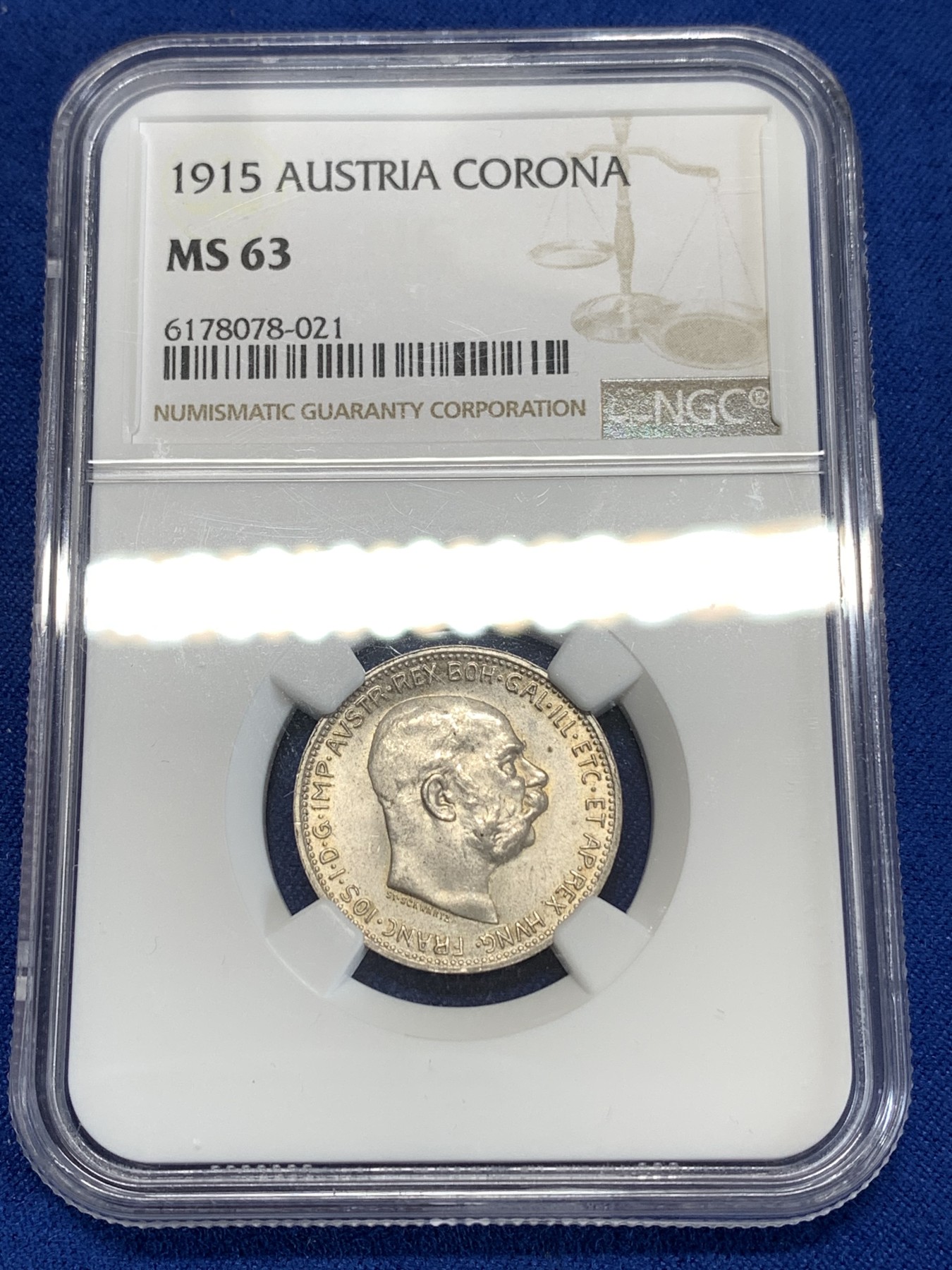 《竞宝斋》第263场-周日，周一 2场连拍 (全场包邮) NGC MS63 奥匈帝国1915年约瑟夫一世1克朗银币，金色包浆，十字转光