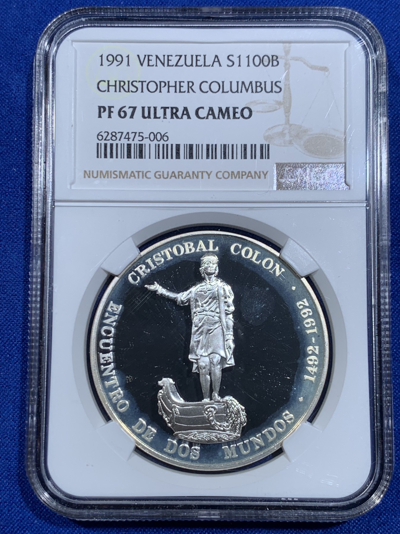 《竞宝斋》第263场-周日，周一 2场连拍 (全场包邮) NGC PF67UC 1991委内瑞拉1100玻利瓦尔银币，非常少见的委内瑞拉银币品种， 纪念哥伦布发现新大陆，正面是哥伦布全身像，背面是拉丁美洲各国国徽图案，委内瑞拉银币也是国际市场的热门品种，不容错过