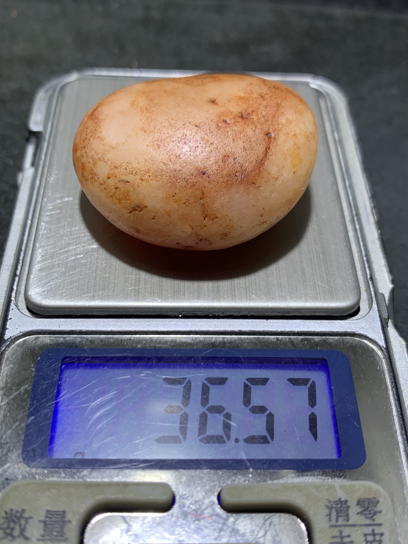 精美天然地表高圆度金丝玉籽料原石一块