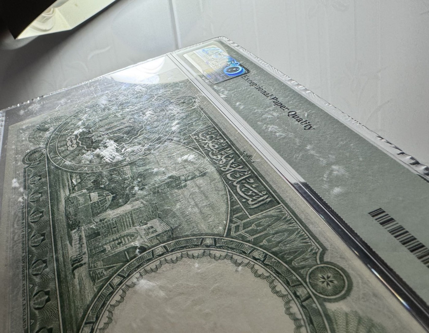 收藏联盟Quantum Auction 第342期拍卖  埃及1948年1镑 PMG65 图坦卡门的面具 壳子为新版壳原始瑕疵