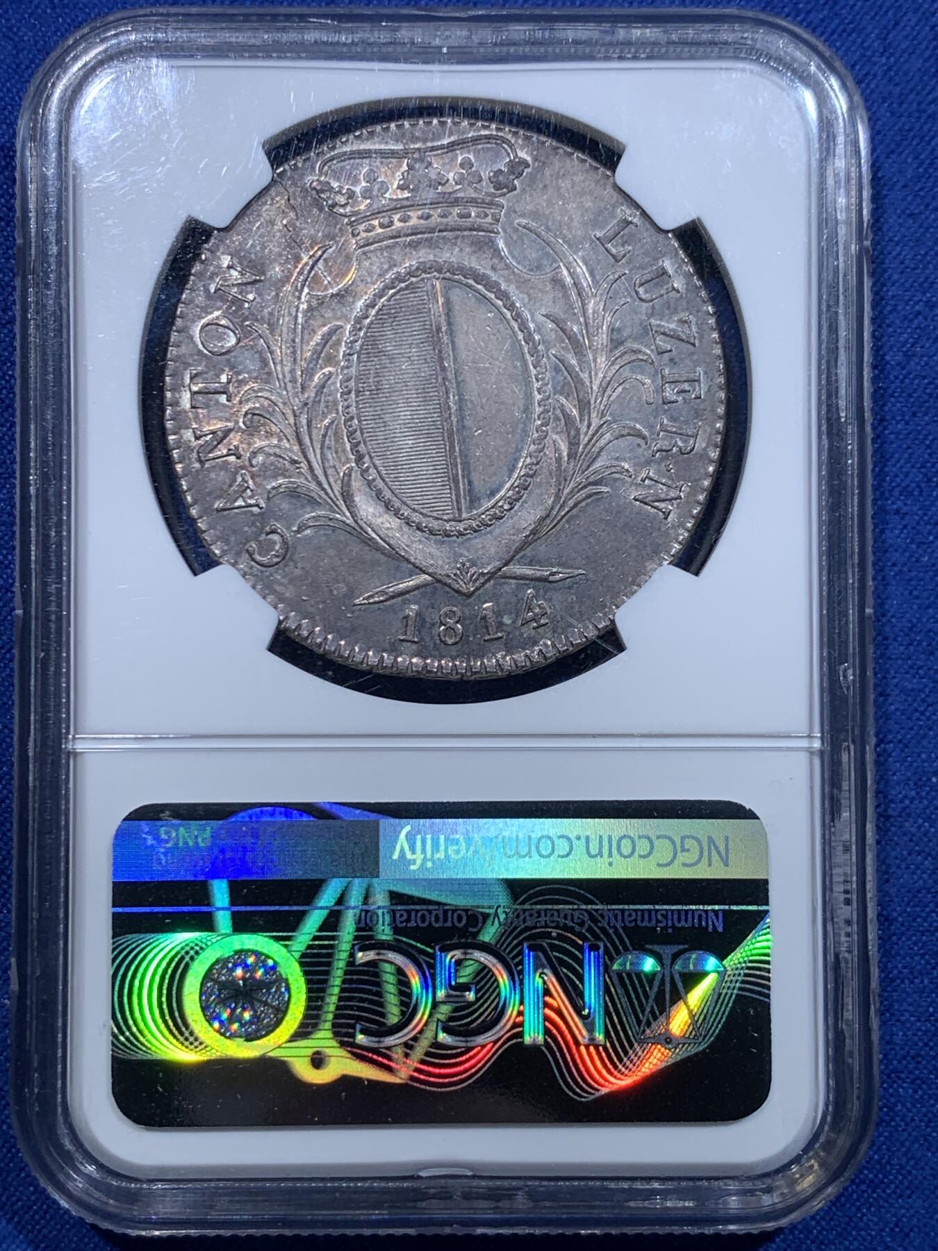 《竞宝斋》立夏专场特拍 （第2-1场）全场顺丰包邮 265场 NGC MS61 瑞士卢塞恩1814年雇佣兵4法郎银币 设计大气古朴 厚重的包浆背后是历史的沉淀 可能是包浆太厚的缘故才给了61分 实际状态感觉不止61分 发行量44000枚 还没怎么涨的瑞士雇佣兵十年前也差不多这个价格 币胚有裂极为难得